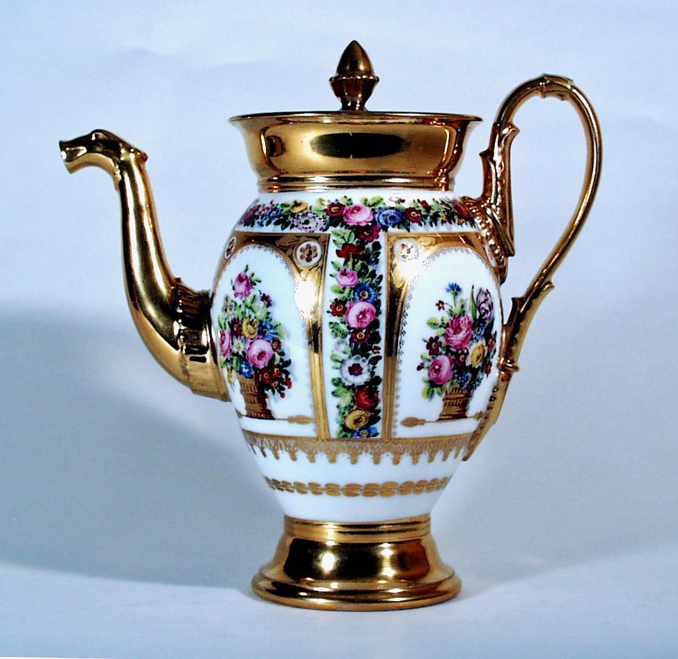 Paris Porcelain Botanical Coffee Pot and Cover, 
circa 1825.

This coffee pot has a gilt foot, handle, spout and rim, it is finely decorated with garlands of flowers running around the shoulder. There are gilt panels with flower arrangements in