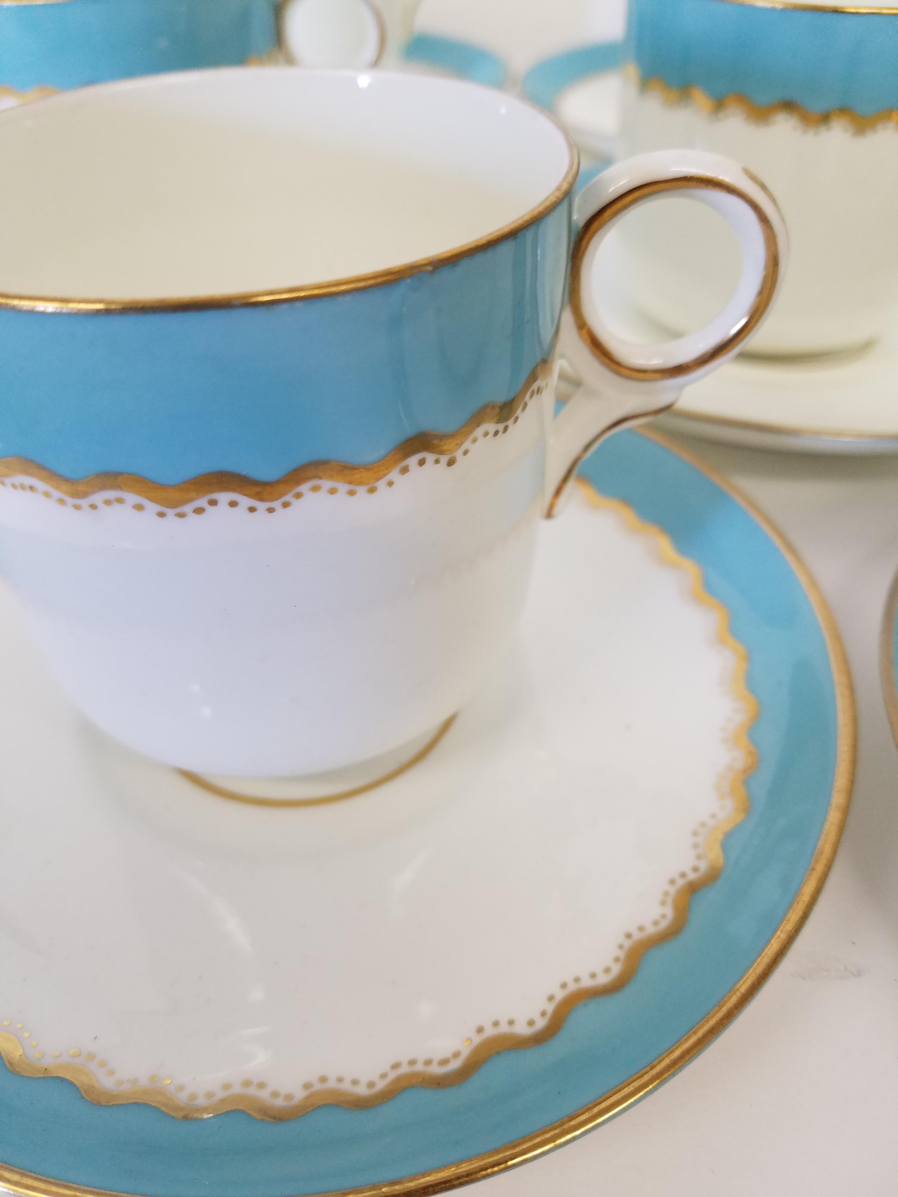 French Paris Porcelain Demi Tasse with Gilt and Robins Egg Blue Banding For Sale