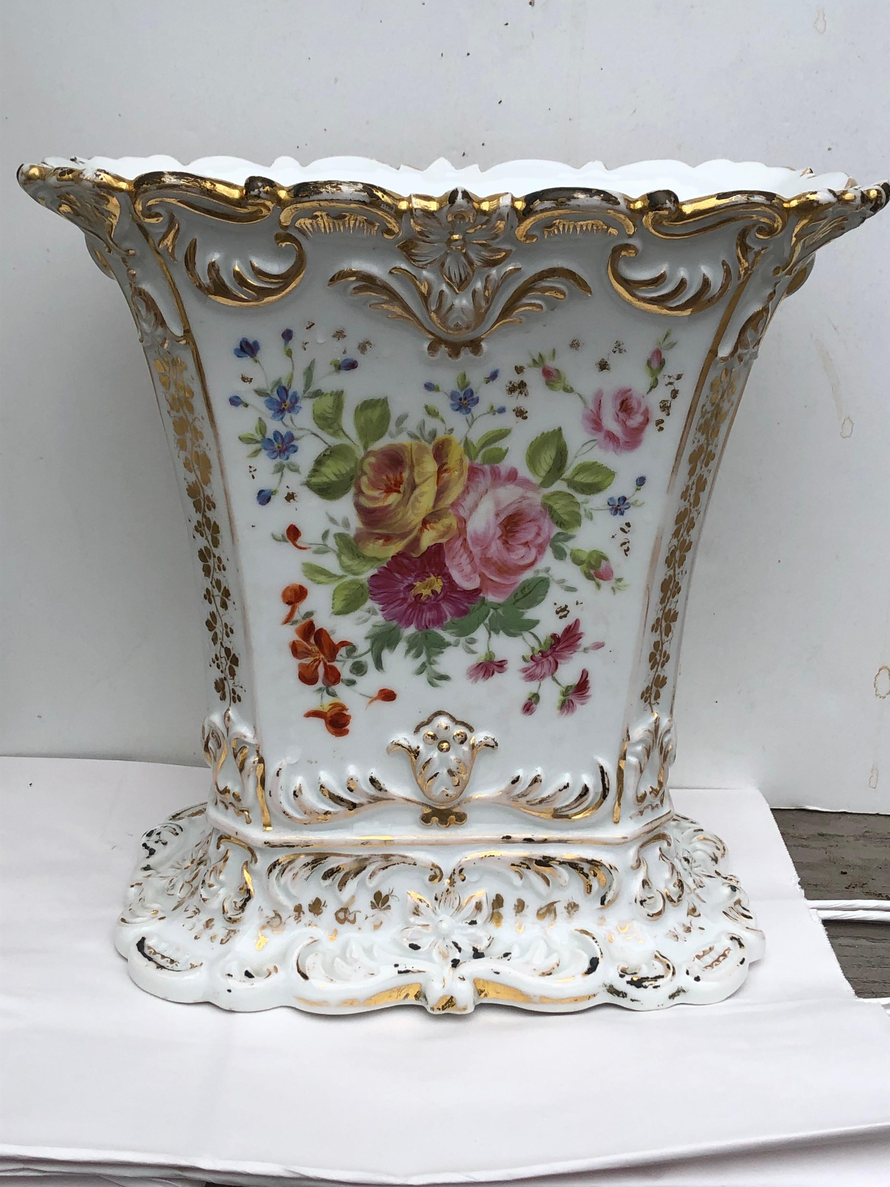 Very large late 19th Paris porcelain rectangular spill vase with gilt details and floral decoration. Elegant size. In good condition. Minor firing crack. There is a star shaped crack to the underside but it does not extend to the interior.