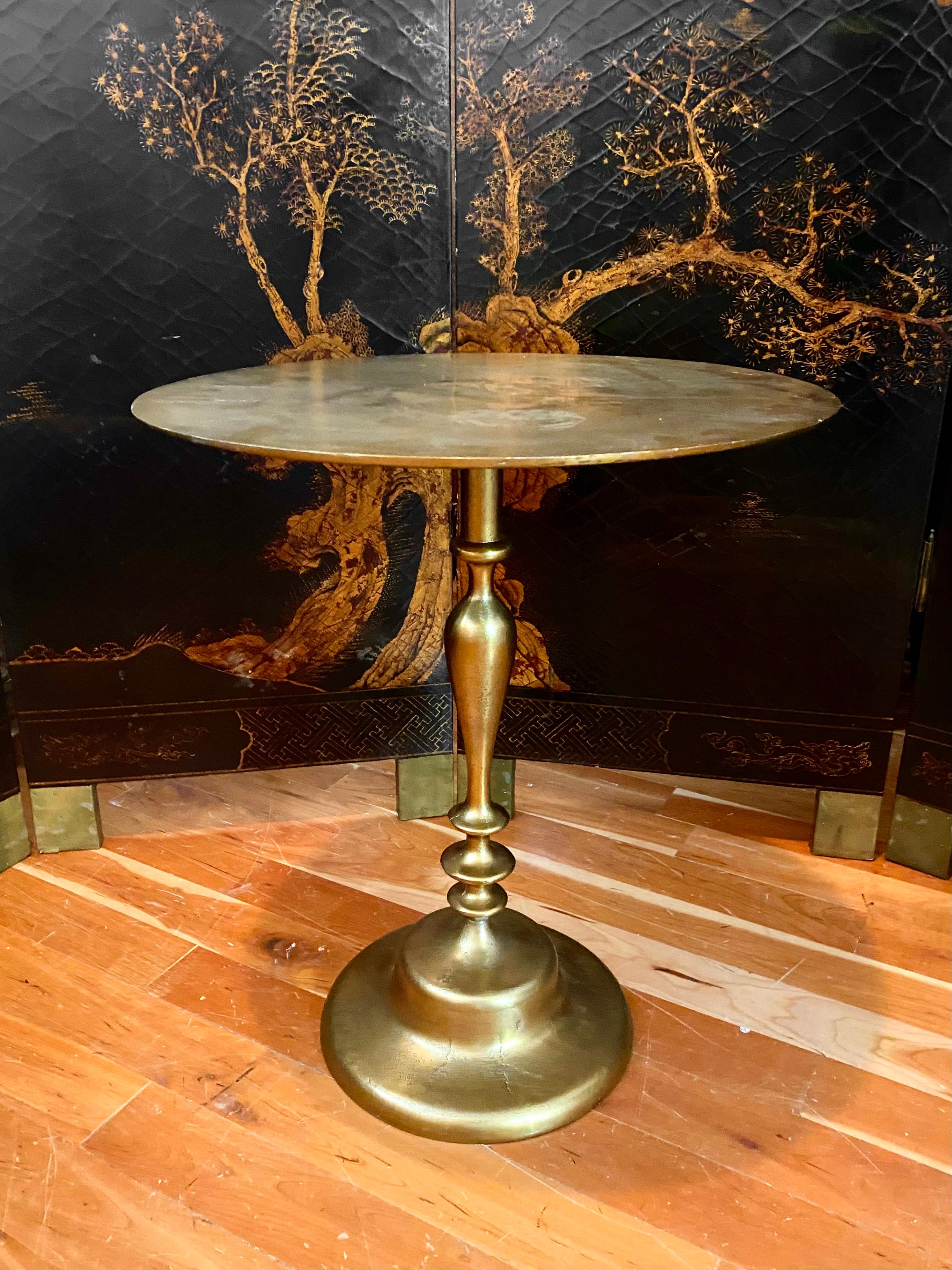 From the famed Paris Ritz Hotel Hemingway bar, bronze side table, versatile piece with a storied past. Mid-Century Modern with all the glamour of Hollywood Regency.