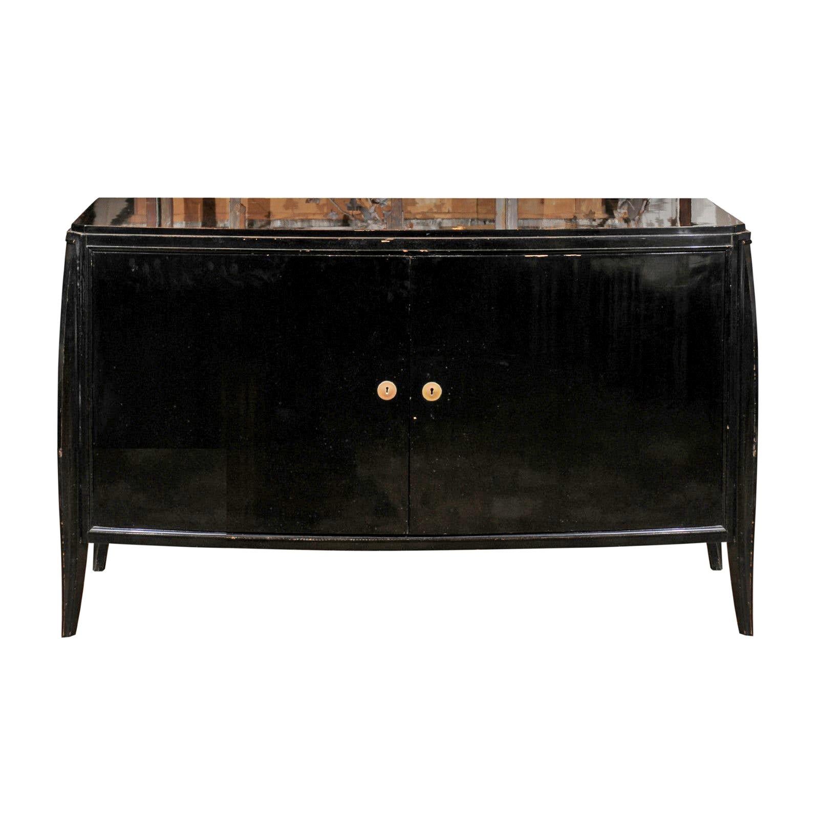 Parisian 1960s Black Lacquered Bow Front Two-Door Cabinet with Splaying Legs For Sale