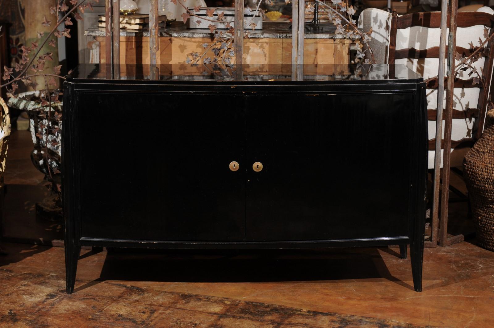 Mid-Century Modern Parisian 1960s Black Lacquered Bow Front Two-Door Cabinet with Splaying Legs For Sale