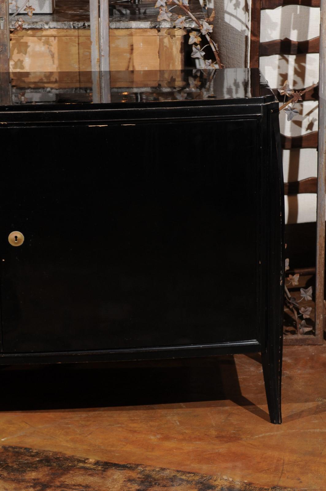 Parisian 1960s Black Lacquered Bow Front Two-Door Cabinet with Splaying Legs In Good Condition For Sale In Atlanta, GA