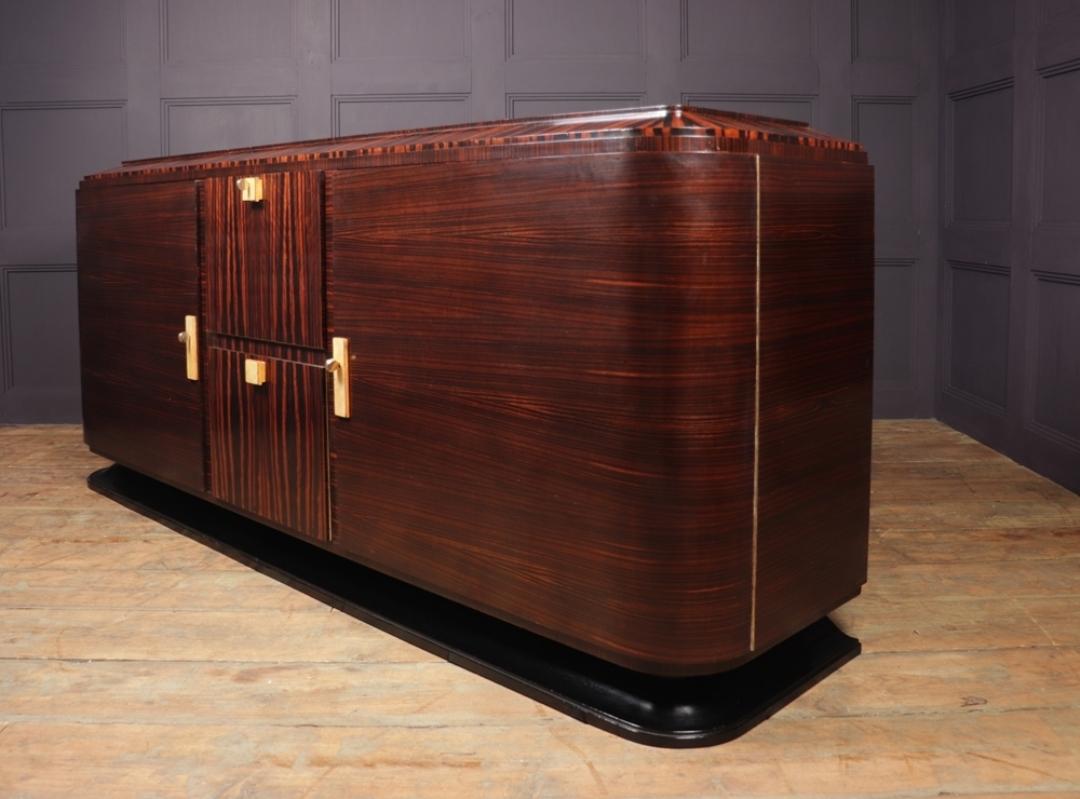 A French Art Deco sideboard in Macassar ebony with Shagreen handles and escutcheon plates, polished bronze headed working keys, with makers ink stamped name on the back “ L’ATELIER LEON BERNHEIM PARIS’ (The Workshop of Leon Bernheim Paris).

The