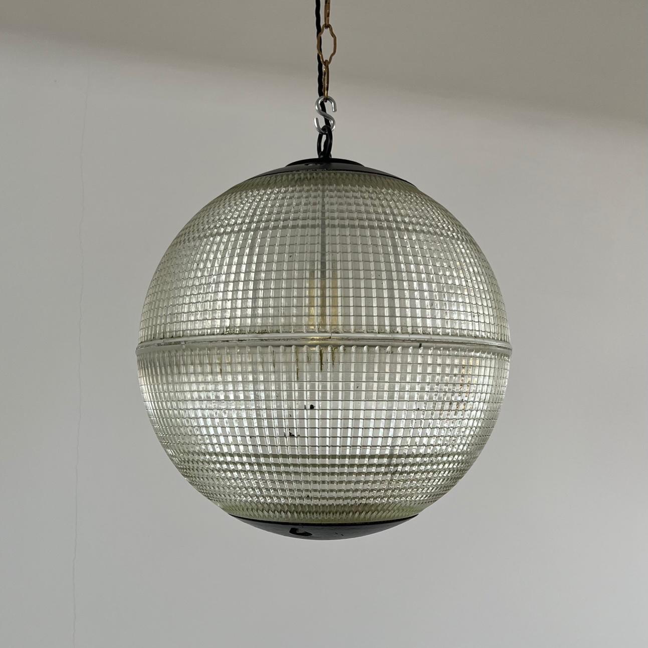 Original mid-century pendant lights. 

40 cm model. 

Paris, France, c1950s. 

Original Parisian street lights, these lights produced by Europhane are formed from thick good quality prismatic glass. 

Since adapted and re-wired. 

No chain