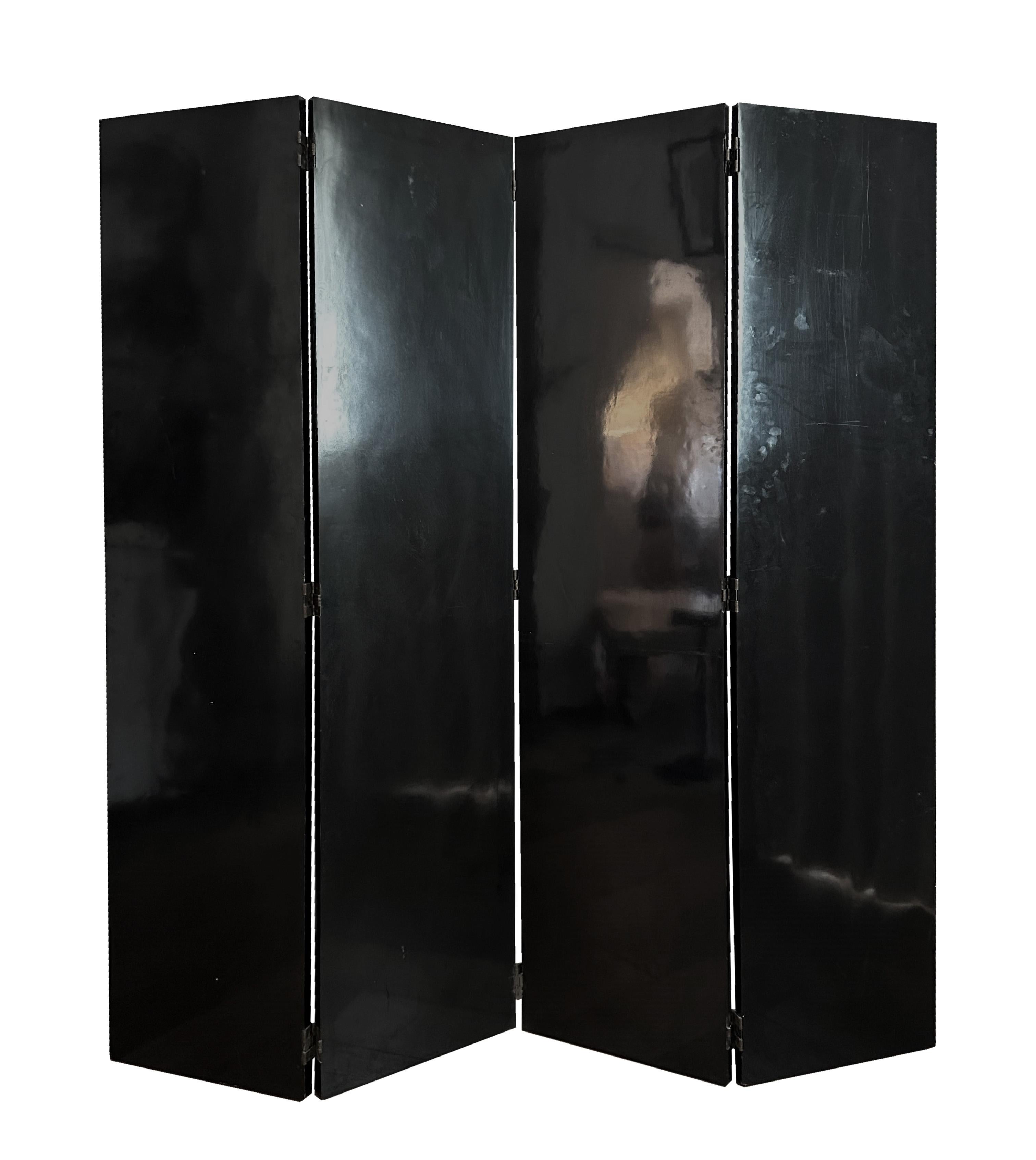 Discover the epitome of Parisian chic with this rare and glamorous lacquered screen, a statement piece that embodies the luxurious spirit of Parisian décor. This exquisite item boasts a striking black and tarnished rose gold lacquer finish on one