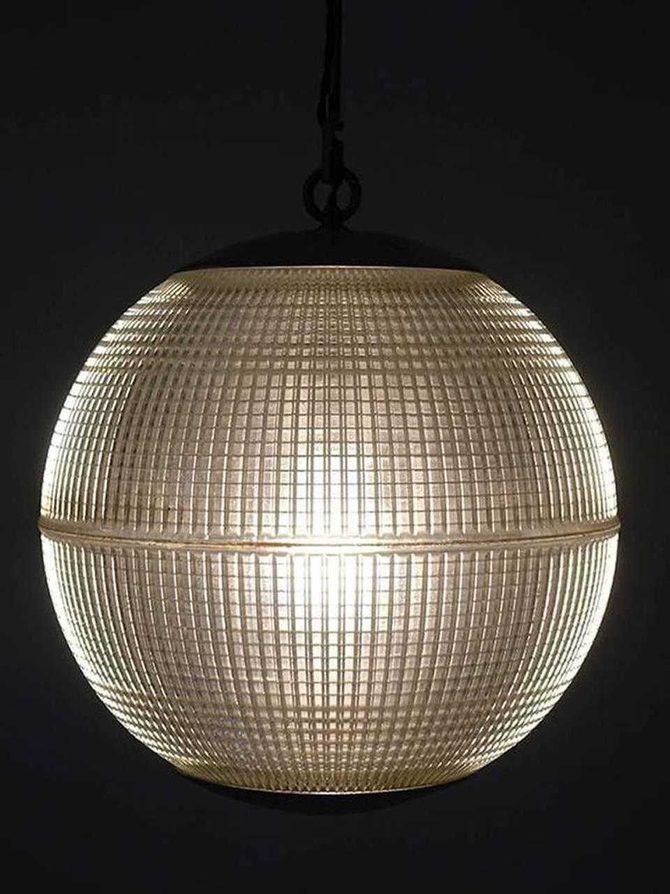These iconic midcentury prismatic spheres once lit the thoroughfares of Paris. If you have spent time there you know these lamps well. Since being saved from their lamp posts, these Industrial globes have been rewired for modern, indoor use and the