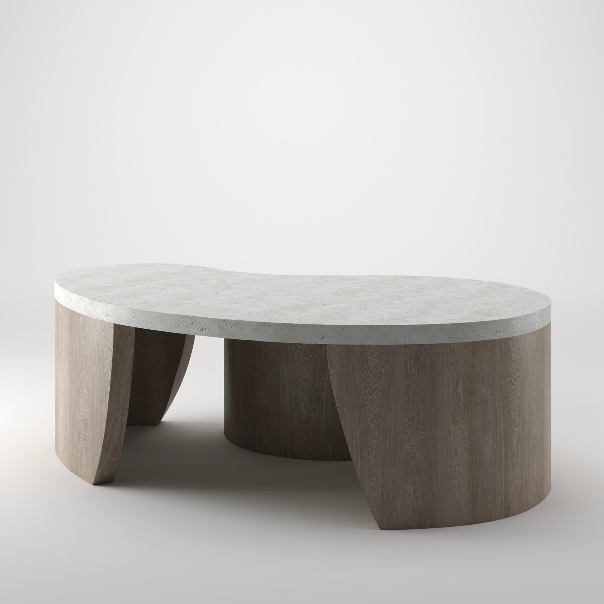 Escultural, moderna y tranquilamente orgánica......la Mesa de Centro Curvas es un centro de mesa cautivador diseñado para aportar una sensación de armonía natural al hogar.   Este dúo de mesas que se cruzan, cada una a una altura diferente, se
