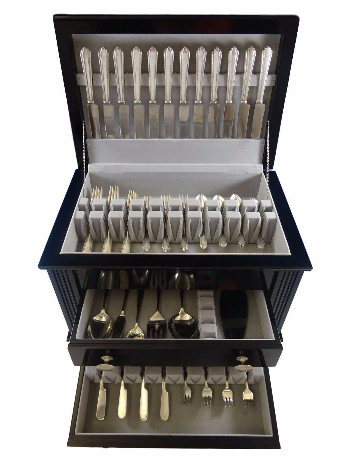 Park avenue by Manchester sterling silver flatware set - 74 pieces. This Art Deco set includes:

12 dinner size knives, 9 3/4
