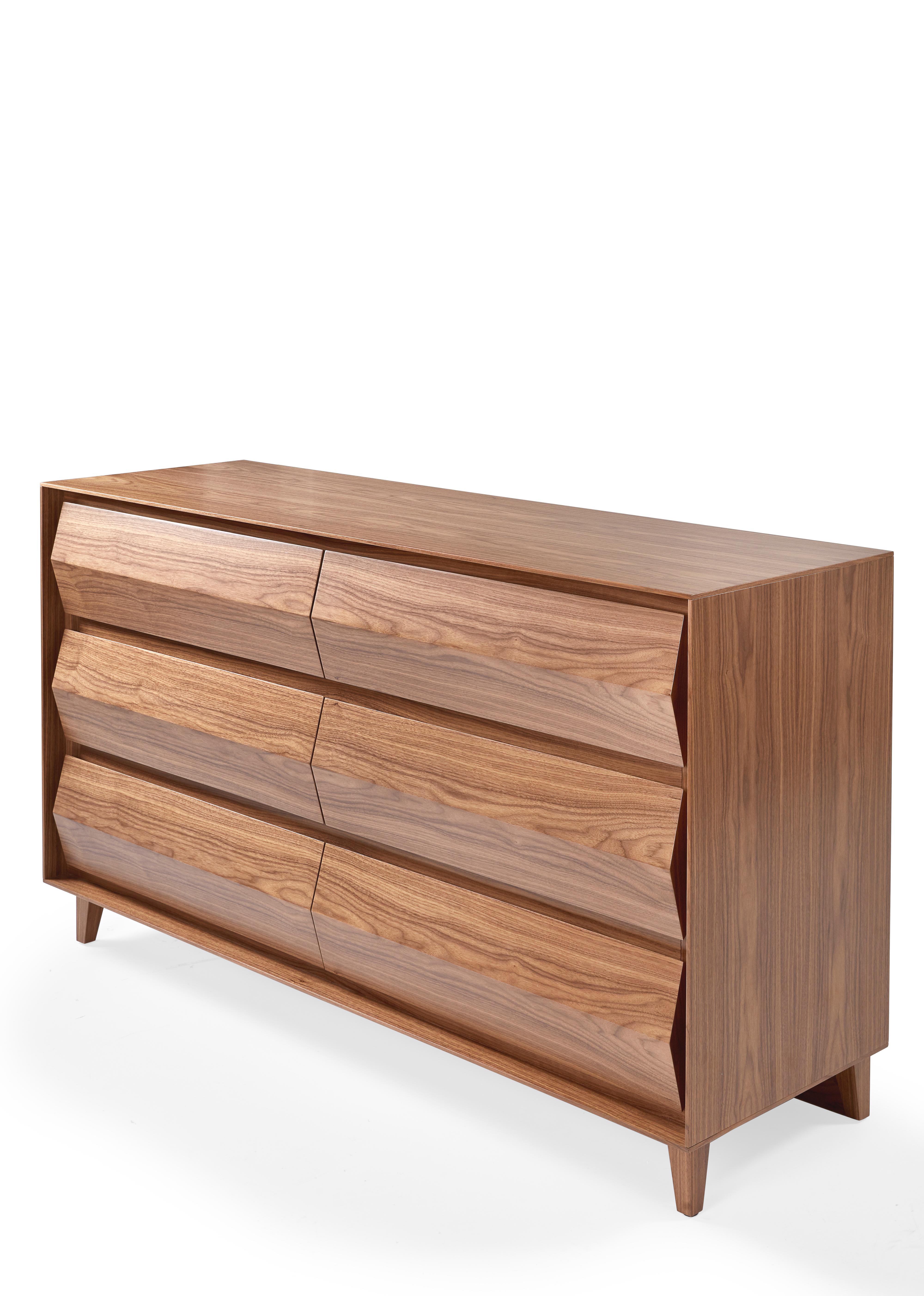 Offering a unique play on reflected light, the angled drawer fronts of the Park Dresser lets the beauty of our natural woods shine. A notched top detail on each drawer allows for easy opening without taking away from the sleek look of the facade.