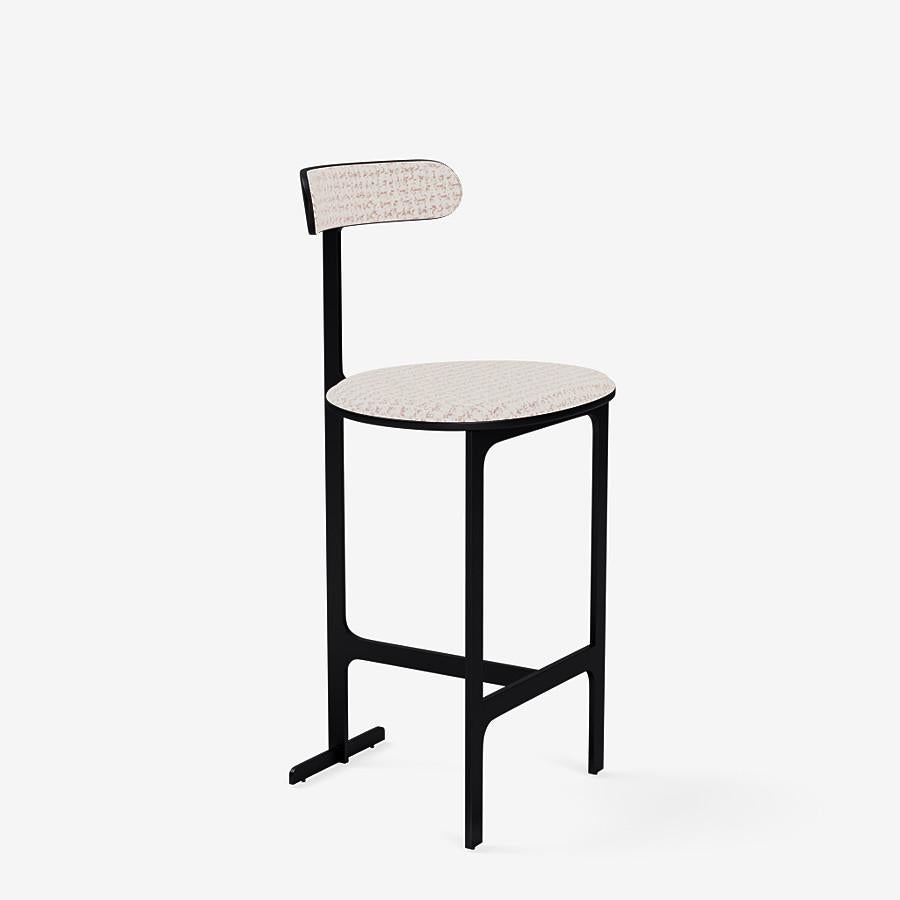 This Park Place counter stool by Yabu Pushelberg in black soft touch is upholstered in Rue Cambon jacquard tweed, made of chenille & velour. Rue Cambon comes in 3 colorways from Italy with a composition of 43% Viscose, 29% Polyester, 15% Nylon, 13%