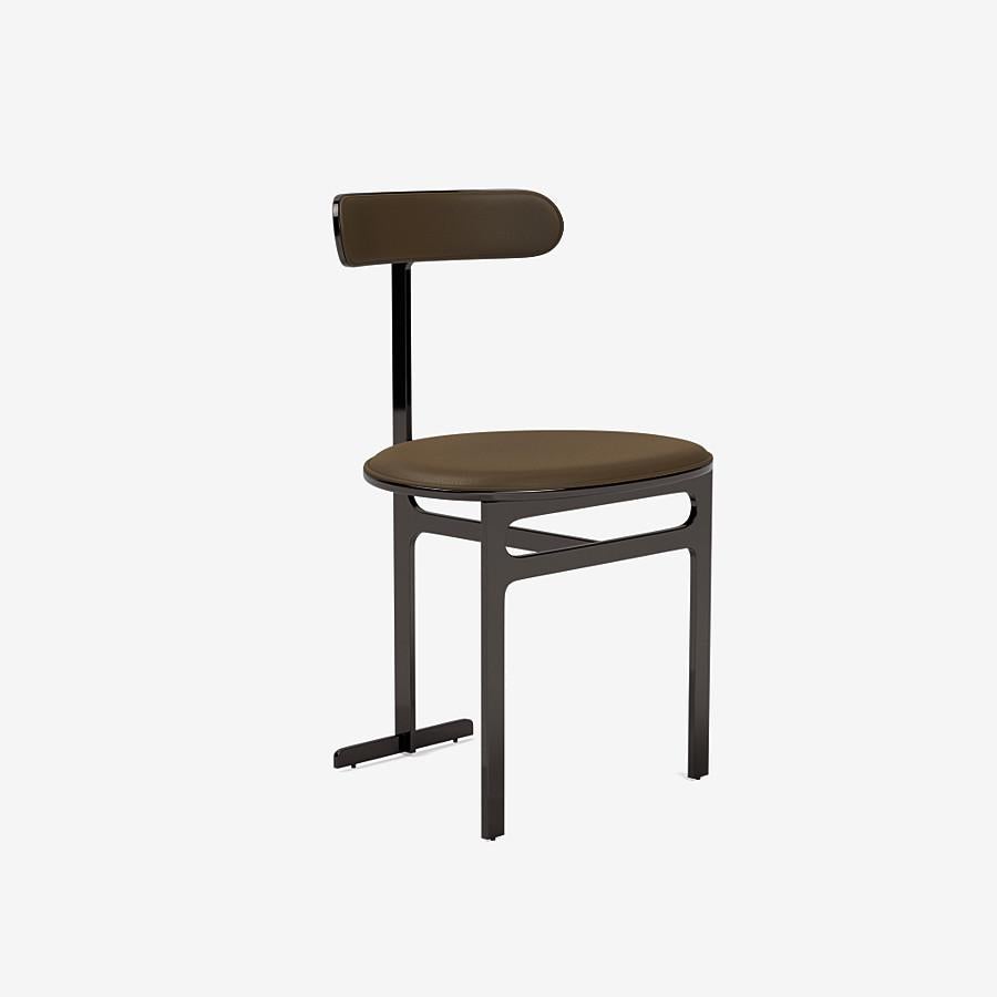 This Park Place dining chair by Yabu Pushelberg in black nickel is upholstered in Ontario Street, pigmented nappa leather with natural grain. Ontario Street comes in 12 colorways from Germany, with a weight of 1.7-1.9mm.

The Park Place design by