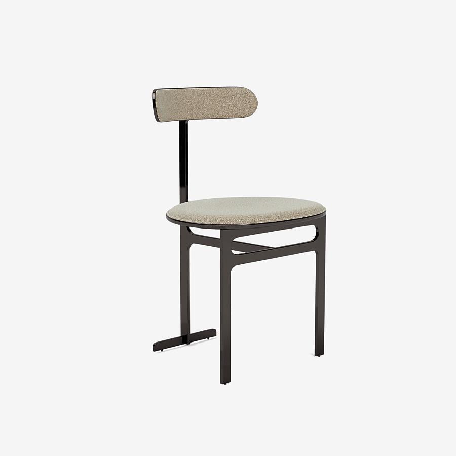 This Park Place dining chair by Yabu Pushelberg in black nickel is upholstered in Trollstigen, tightly woven bouclé wool. Trollstigen comes in 7 colorways from Norway with a composition of 94% New Wool, 6% Nylon, a weight of 765g/m and a Martindale