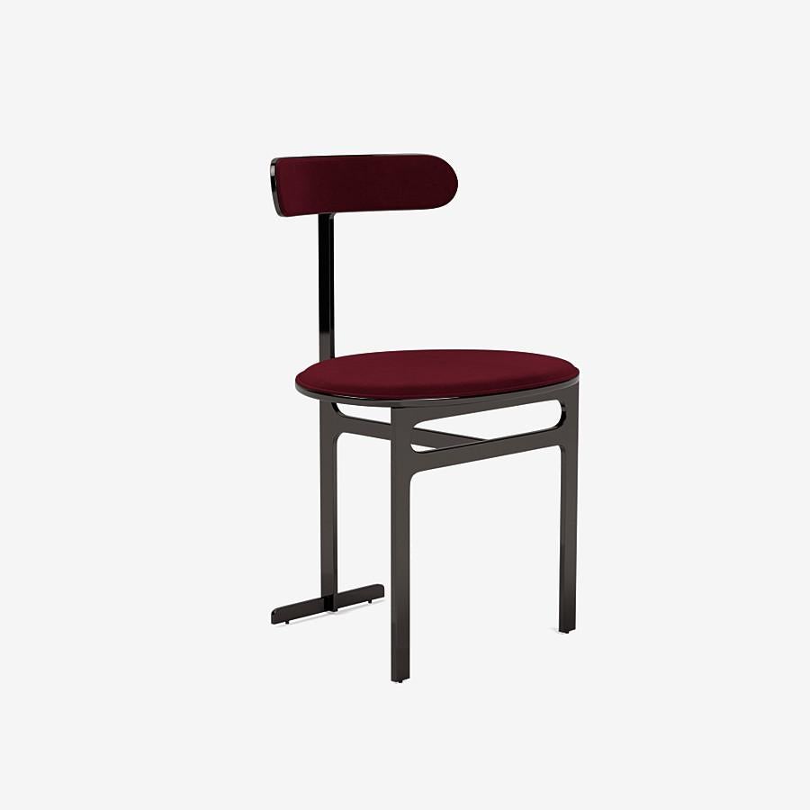 This Park Place dining chair by Yabu Pushelberg in black nickel is upholstered in Via de' Tessitori, high pile polyester velvet. Via de' Tessitori comes in 7 colorways from Italy with a composition of 100% fire rated Polyester, a weight of 960g/m