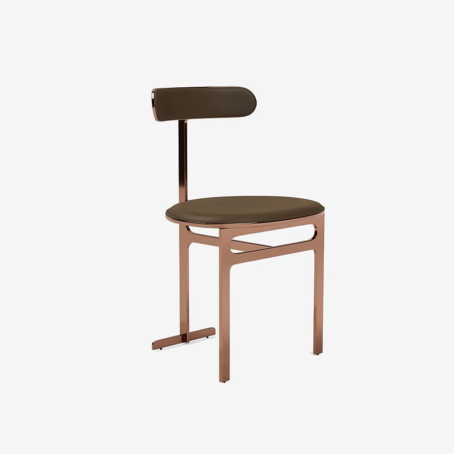 This Park Place dining chair by Yabu Pushelberg in rose copper is upholstered in Ontario Street, pigmented nappa leather with natural grain. Ontario Street comes in 12 colorways from Germany, with a weight of 1.7-1.9mm.

The Park Place design by