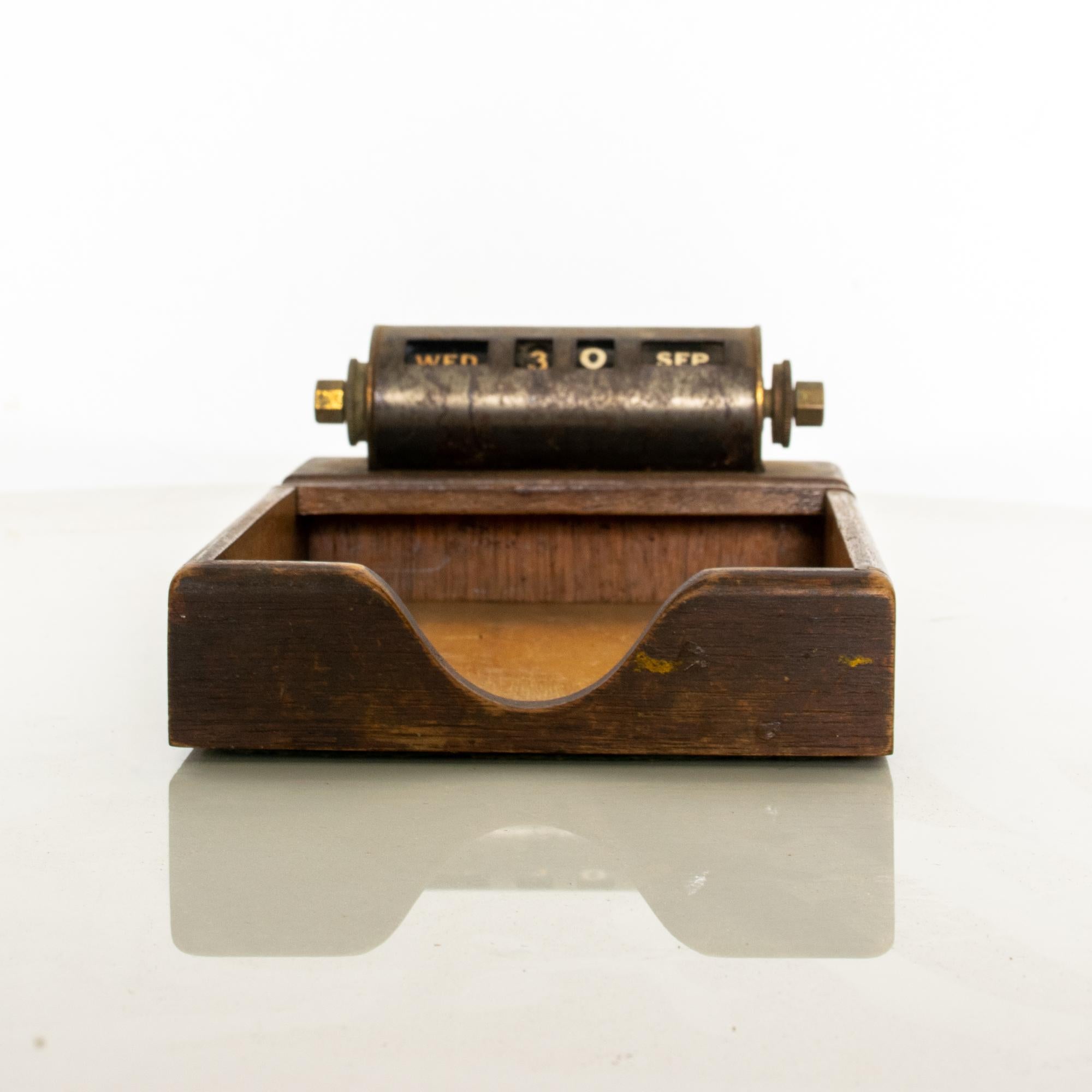 1950s Desk Calendar notepaper holder tray

Perpetual Calendar by Park Sherman Co 
Solid Walnut and Brass.
Springfield, IL 
4.75 x 7 D x 2.38H
Original Preowned Unrestored Vintage Condition. Delightful distress.
Review all images.

