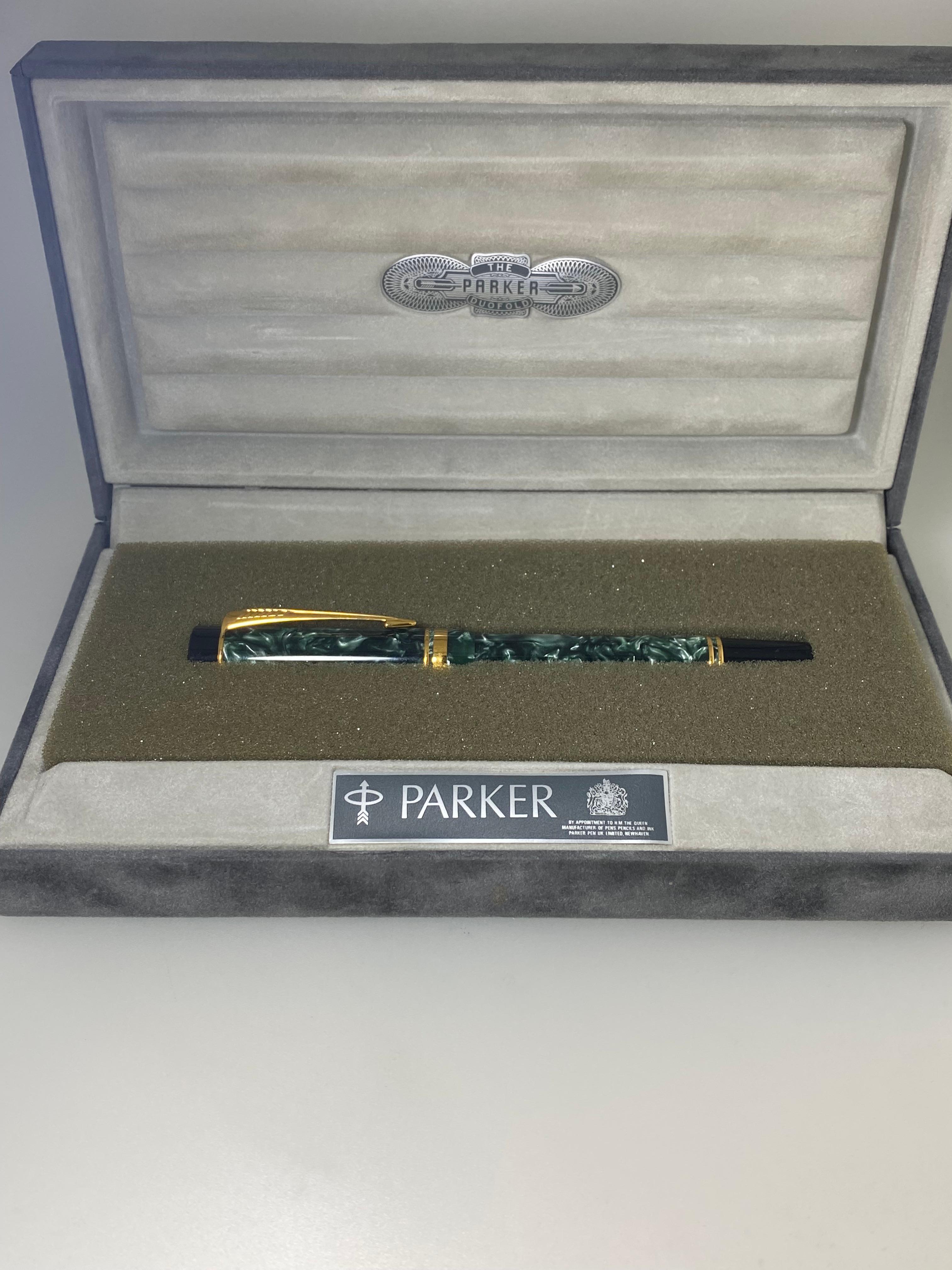 Parker DuoFold Fountain Pen
in gorgeous marble green, 
with black & gold accents

13.5cm long 
18K Yellow Gold Broad Nib
Brand New

Comes in original box, 
accompanied by replacement cartridges
