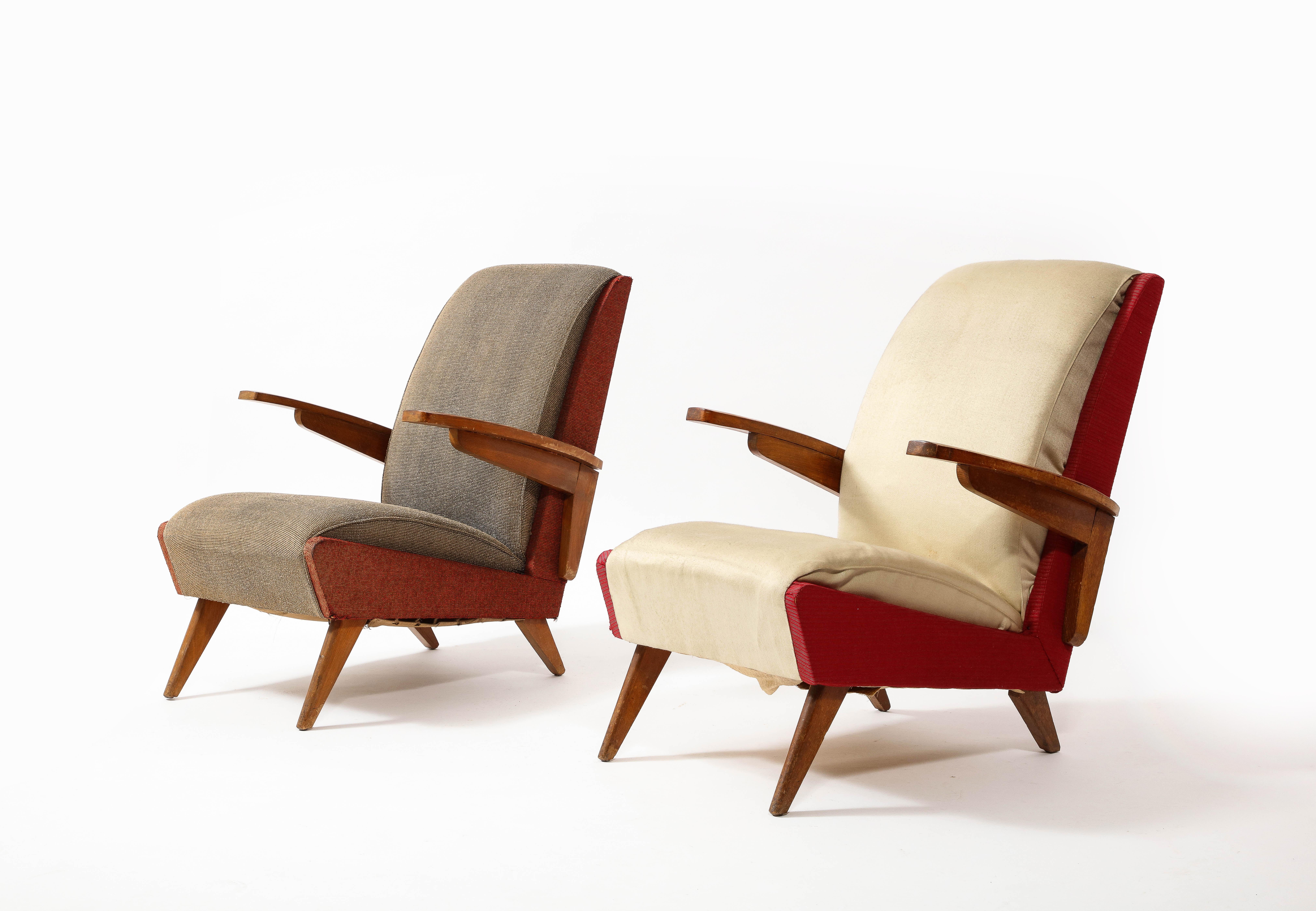Oak armchairs by Parker Knoll, sold as is but COM and refinishing are available. 
