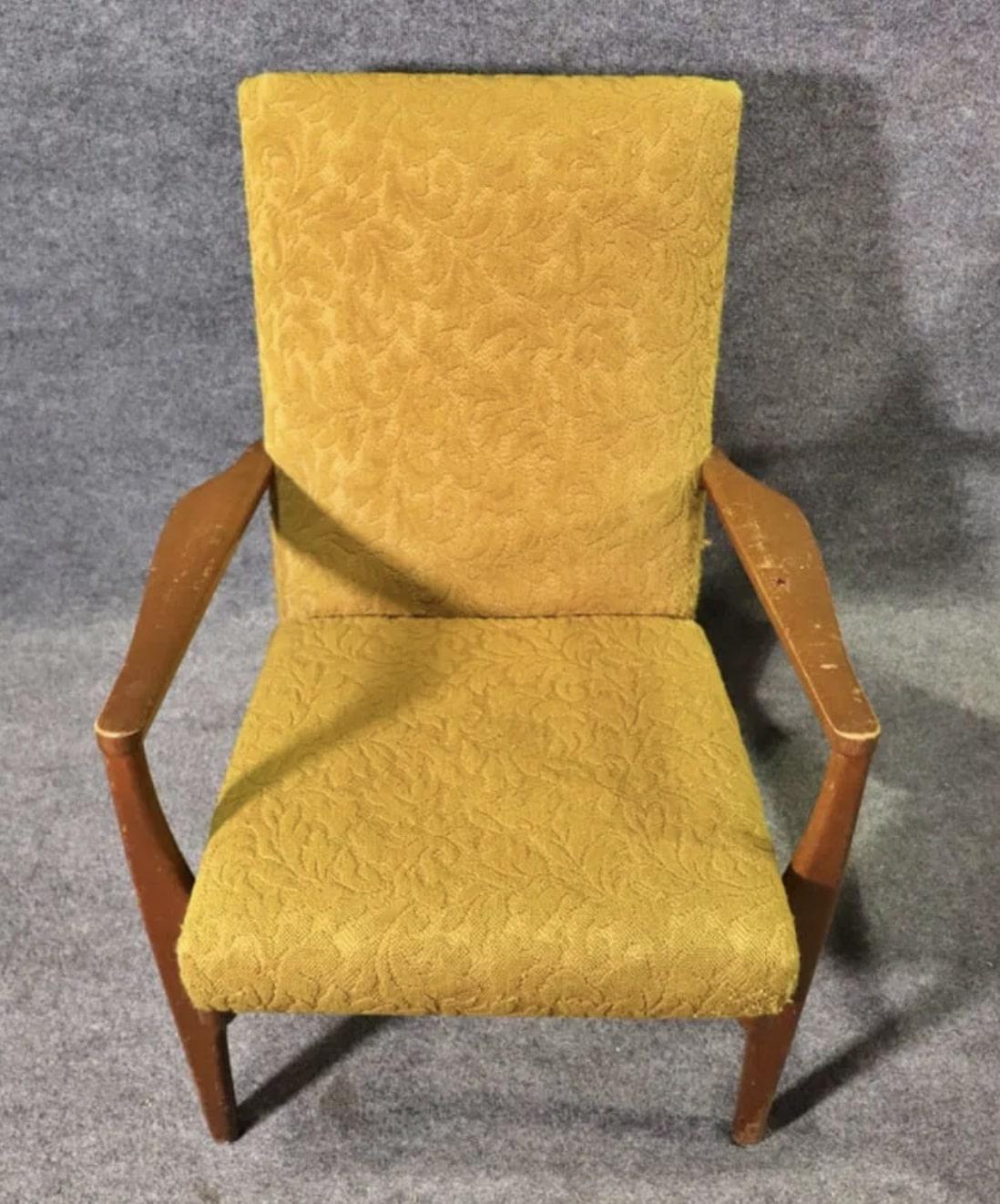 Pair of walnut frame armchairs by British furniture maker Parker Knoll. Sculpted arms with a widening shape for your elbows, tall back, and original 1960s upholstery. Model number PK973-4.
Please confirm location NY or NJ