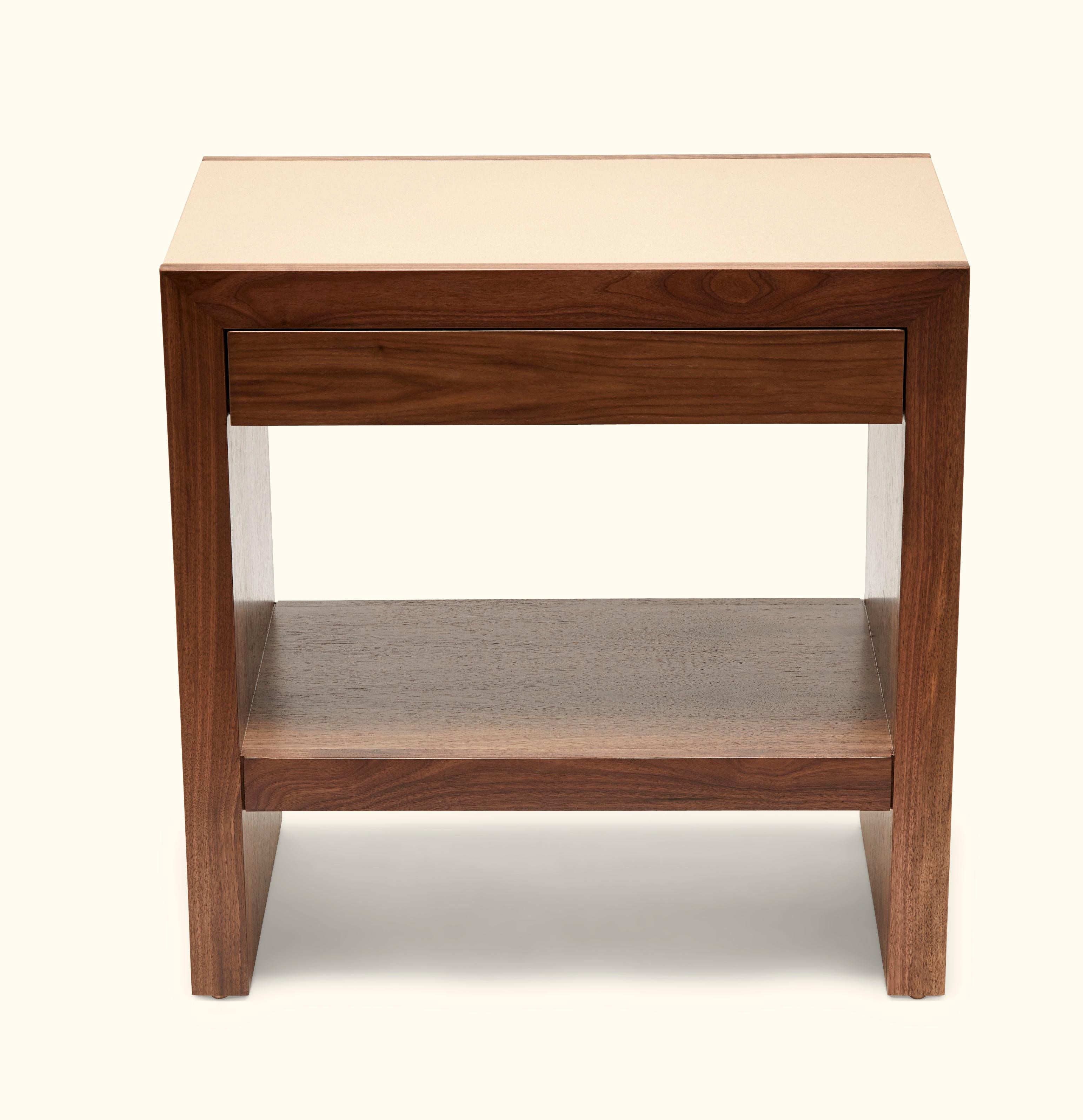 The Parkman nightstand features a Parsons-style waterfall shape with cork on the top and sides and one drawer. Available in American walnut and oak and 5 different cork colors. Shown here in natural walnut and champagne cork. 

Cork and Walnut