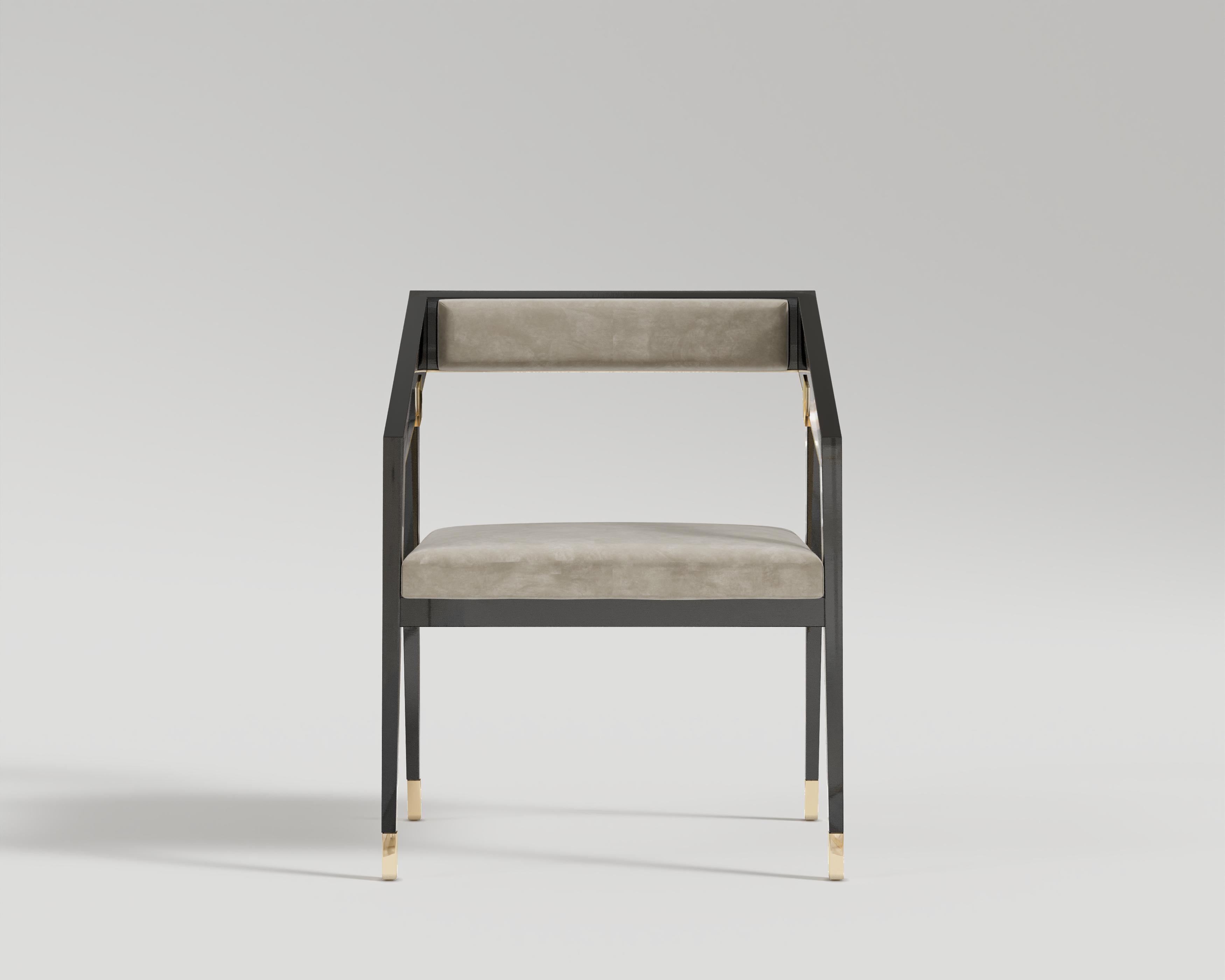 Parma Dining Chair
An elegant modern art deco design brings a timeless silhouette and exudes luxury within the home. Black lacquer frame with elegant polished bronze details and accommodating seat and backrest filled with premium