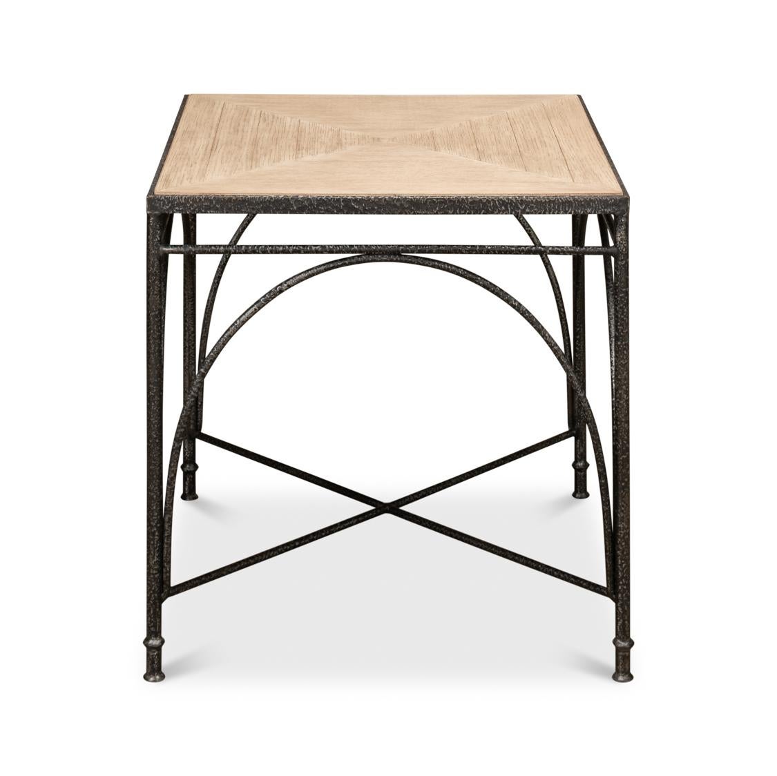 Featuring a light wood color Pine top that offers both durability and a warm, inviting look on an iron base. The robust black metal frame base gives a nod to classic craftsmanship with its intricate cross-bracing detail, promising stability and