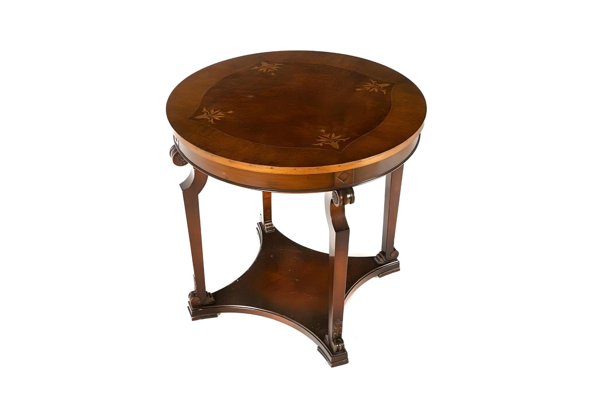 Mid-20th century, Mahogany with satin inlay with scrolling supports, vase on top not included.

Diameter: 75cm (29.5) inches
Height: 70cm (27.6) inches.