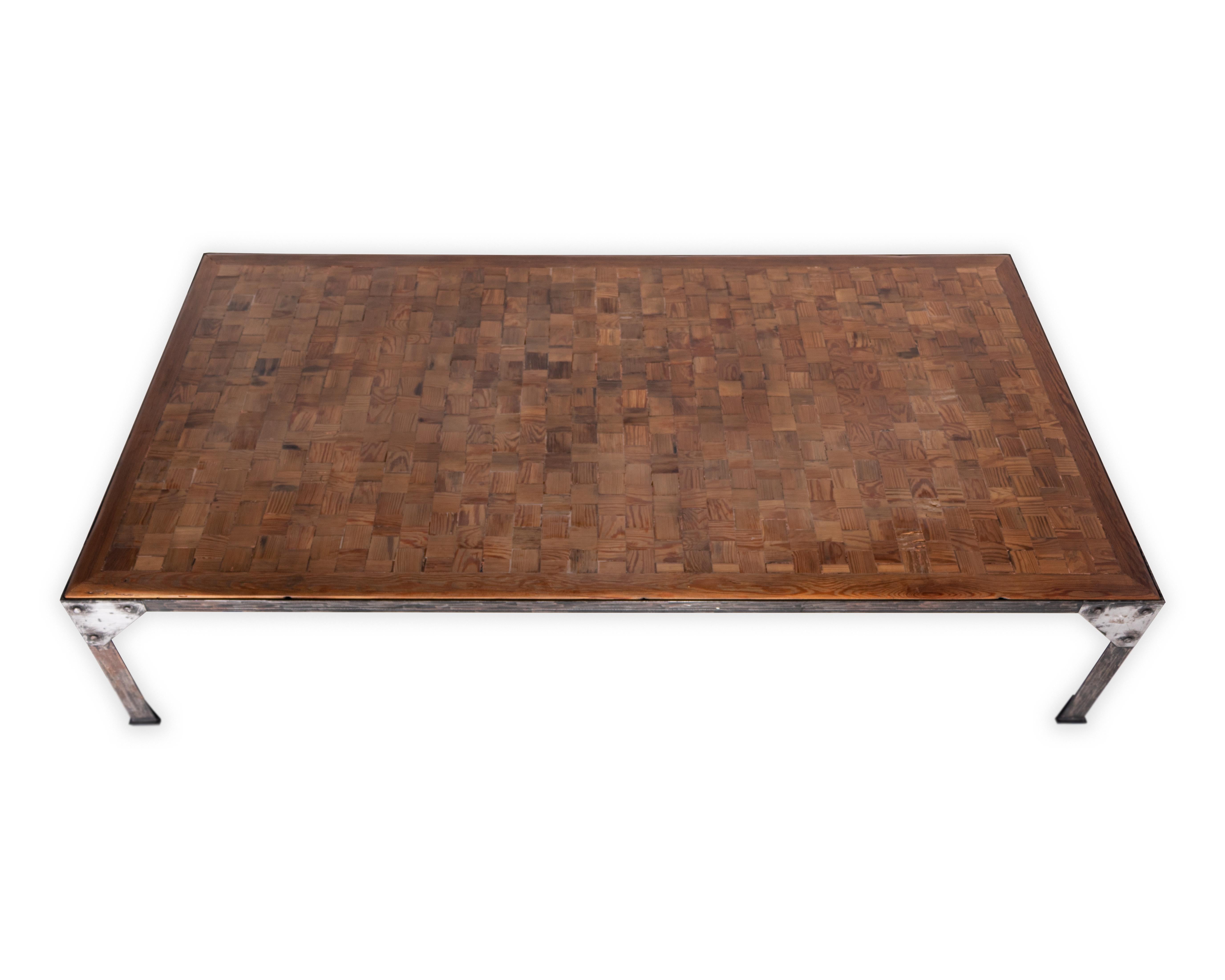 Parquetry top iron base coffee table. 
 
Piece from the Le Monde collection. Exclusive to Brendan Bass.
 
