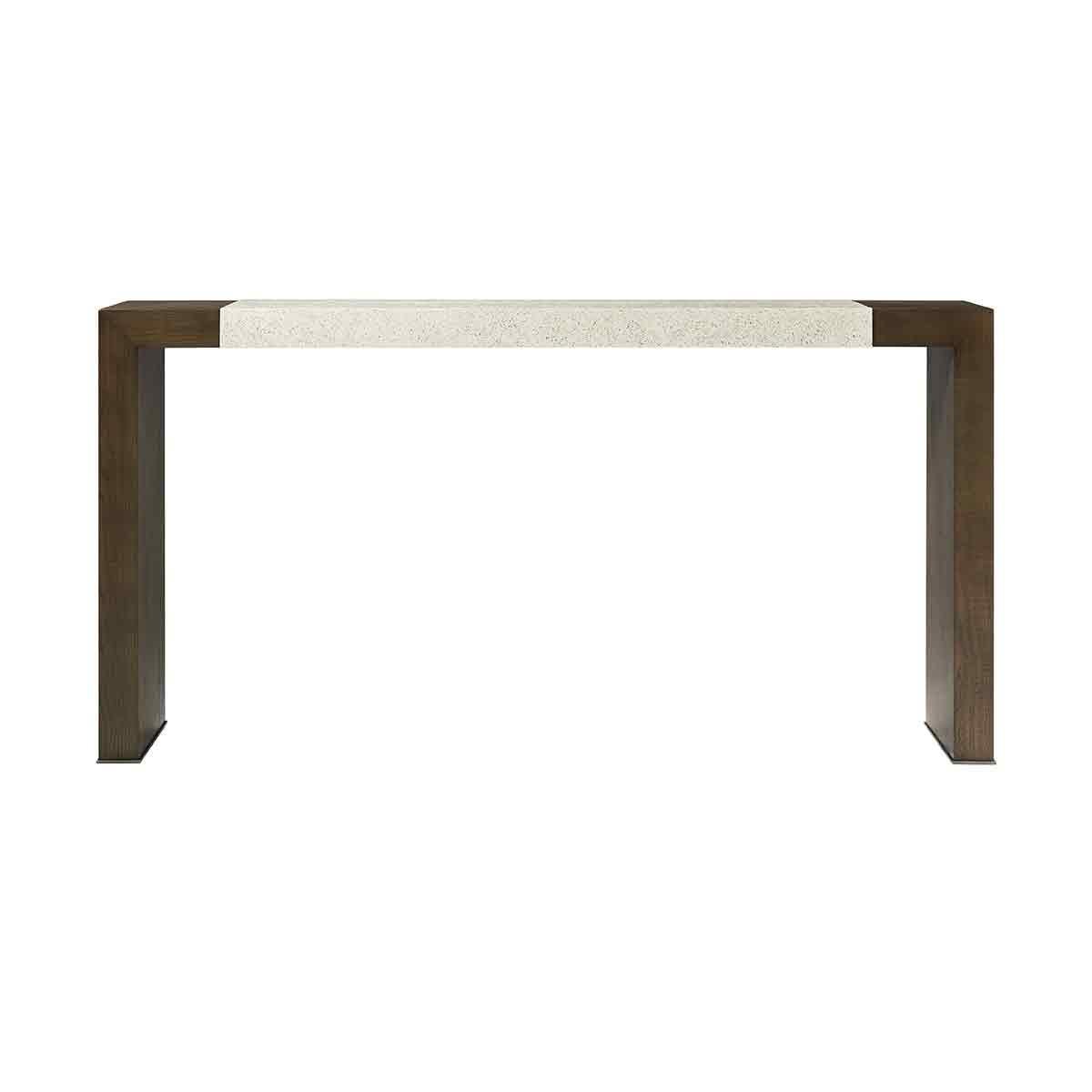 A modern parsons style console table made of figured ash in our dark earth finish with our exclusive Mineral finished top and metal detail at the base of the legs in a bronze finish.

Dimensions: 66