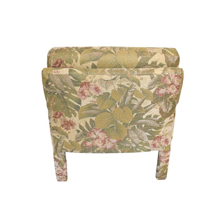 Parsons Mid-Century Modern club chair in original tropical floral print upholstery. The bottom cushion is detachable with removable covers and hidden zippers. Upholstery is original and in beautiful condition. It may have some slight areas of