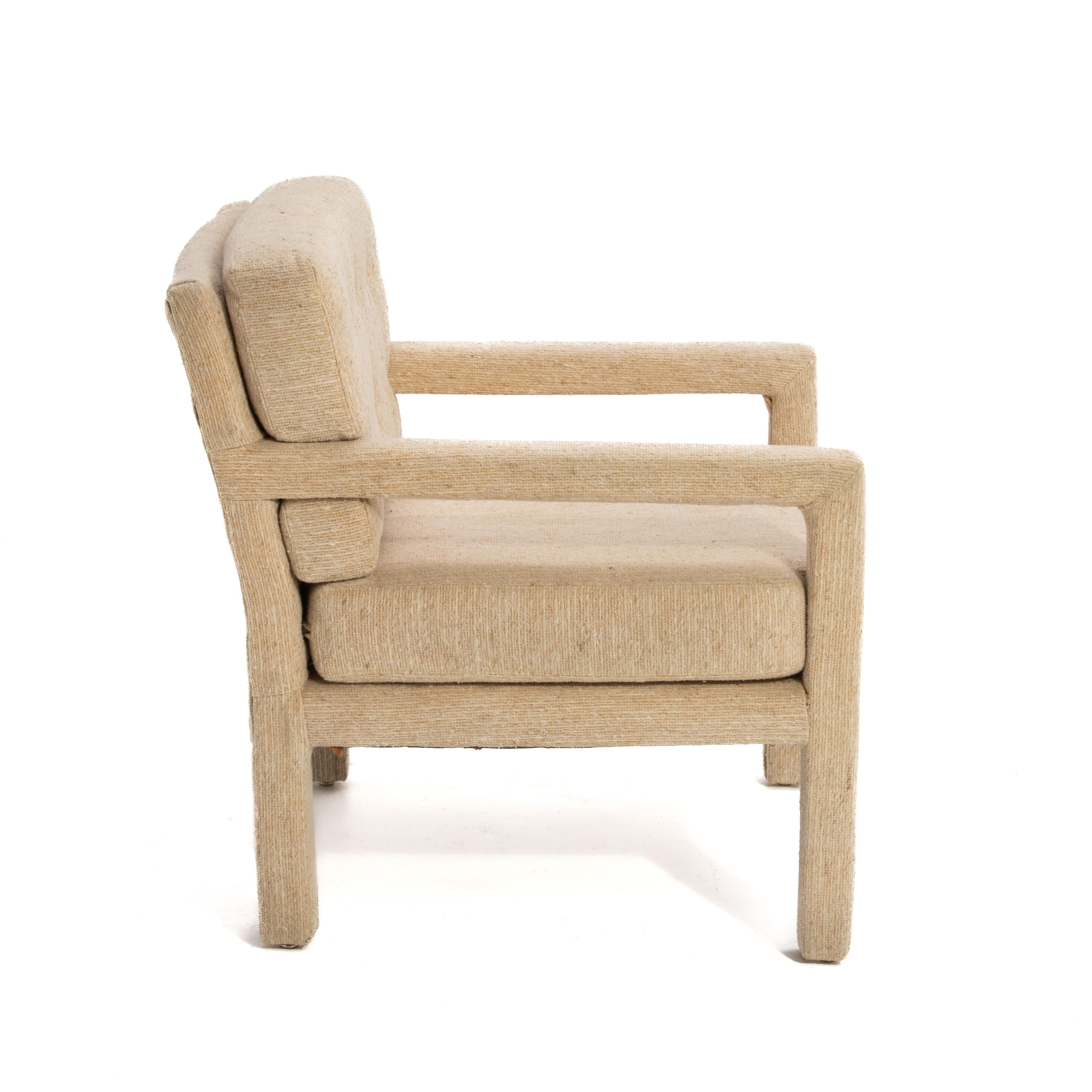 An extremely well made Parsons Lounge Chair after the design of Milo Baughman for Thayer Coggin. Tufted back and flat seat, both cushions are attached. The cushions are cut out around the arms and the upholstery work is excellent, this tells me it