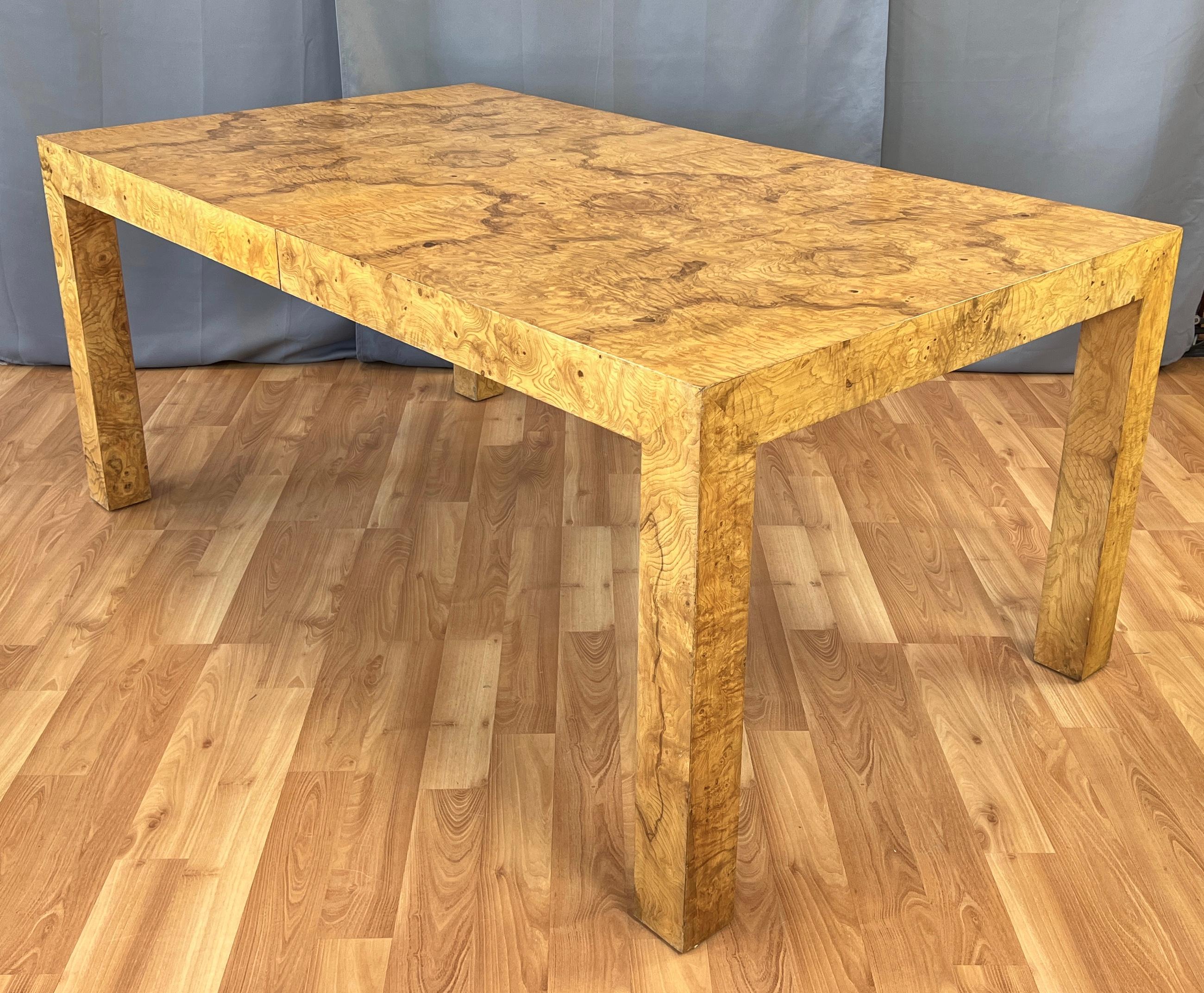Offered here is a Parsons style dining table in Maple Burl designed by Milo Baughman for Thayer Coggin.
Classic clean lines, with wonderful burled wood grains giving a stunning look. 
Table is in such nice condition, that it looks to have been
