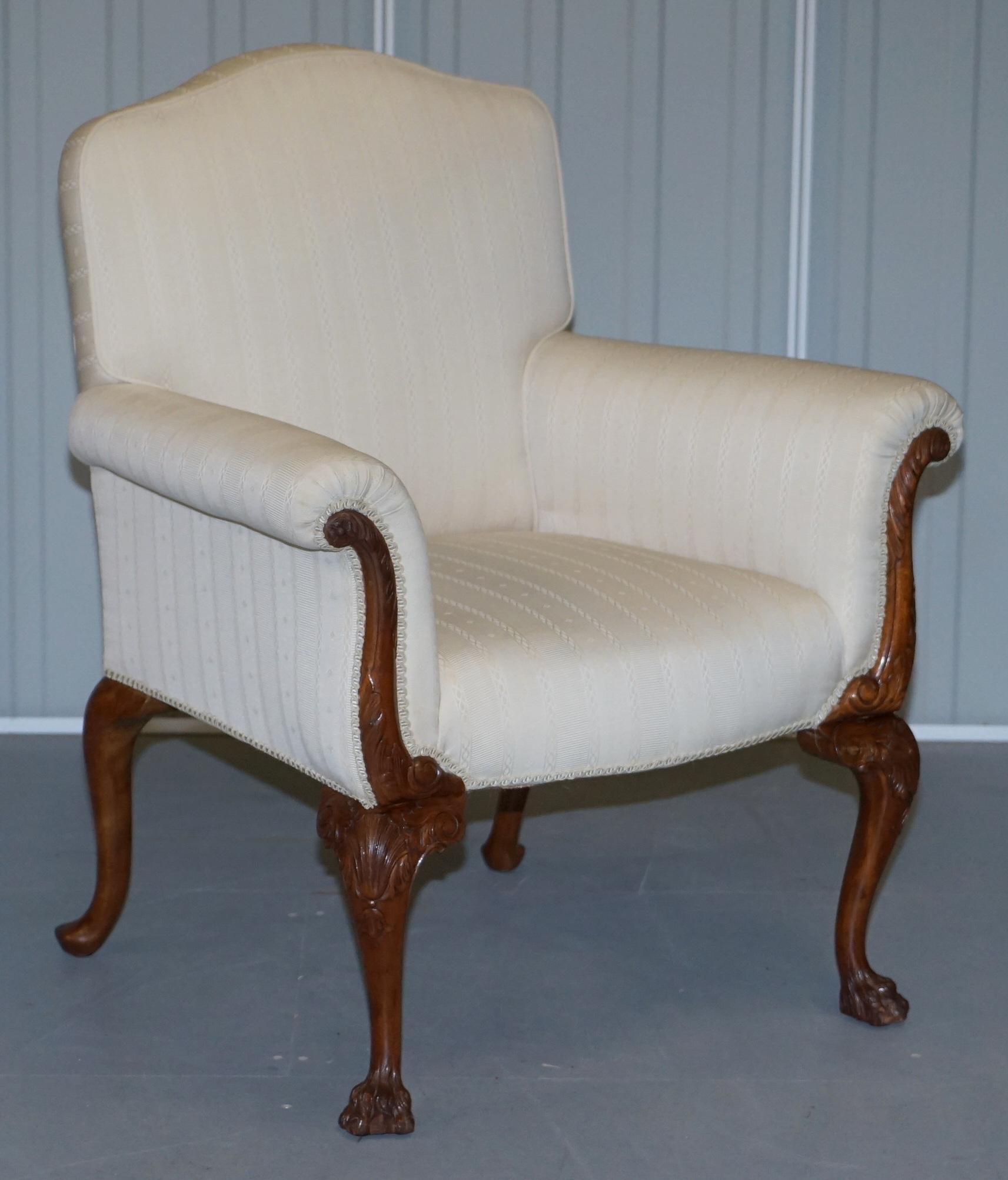 We are delighted to offer for sale this very nice pair of mid century Occasional armchairs with ornately hand carved Lion Hairy paw feet and frames


This pair of armchairs are exquisite, the solid walnut frames are ornately carved, they depict