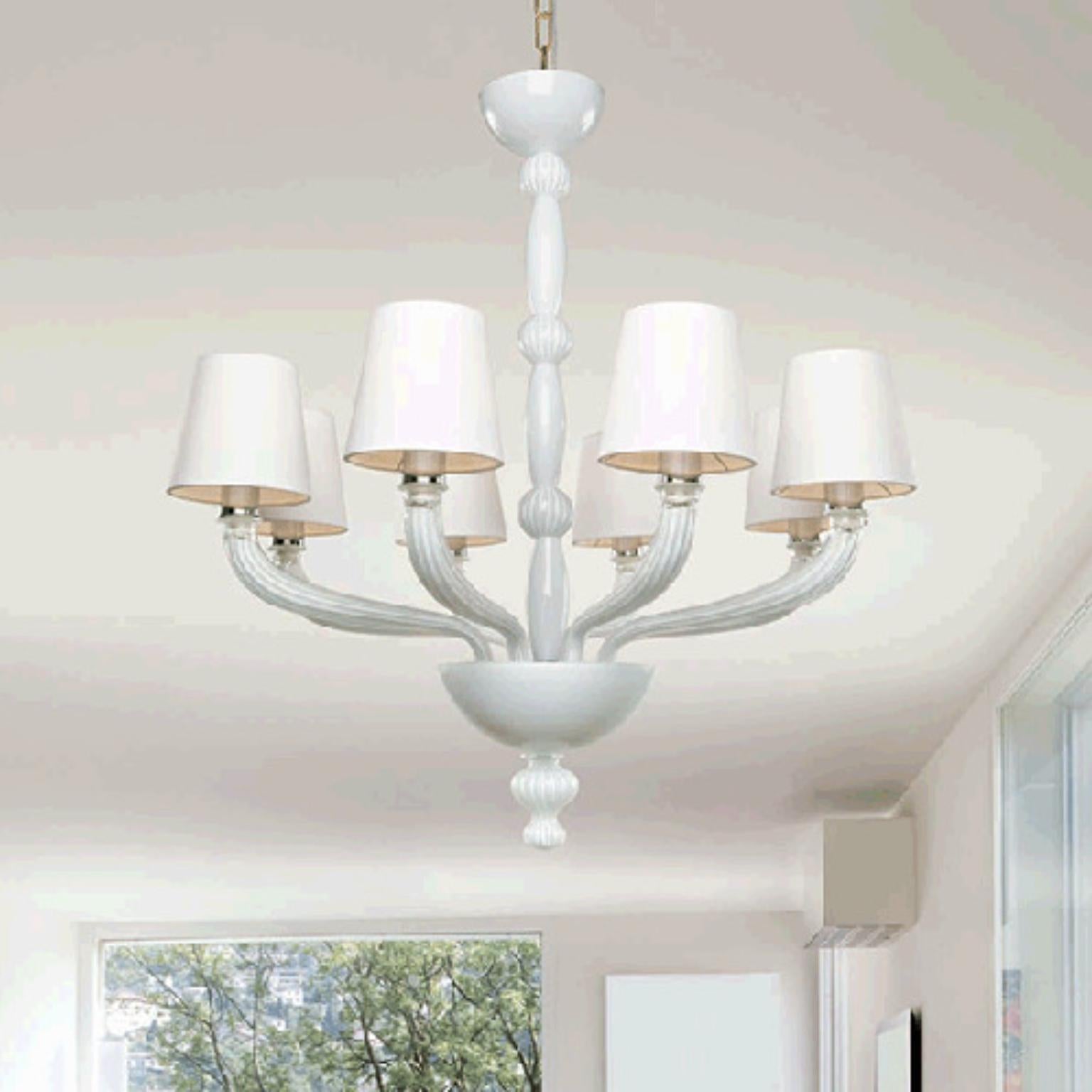 Lampada a sospensione Partecipazio PARSOV08 di Mazzega 1946
Dimensioni: D 78 x H 78 cm.
Materiali: Telaio: Cromo lucido. 
Diffusore: Whiting.
Peso: 009 Kg.

Le radici di Mazzega1946 affondano a Murano, terra di maestri vetrai che ancora oggi