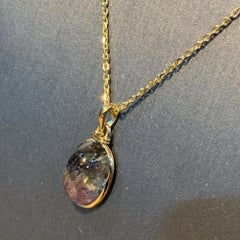 Parti-colored upcycled tourmaline cabochon and 14k yellow gold pendant necklace