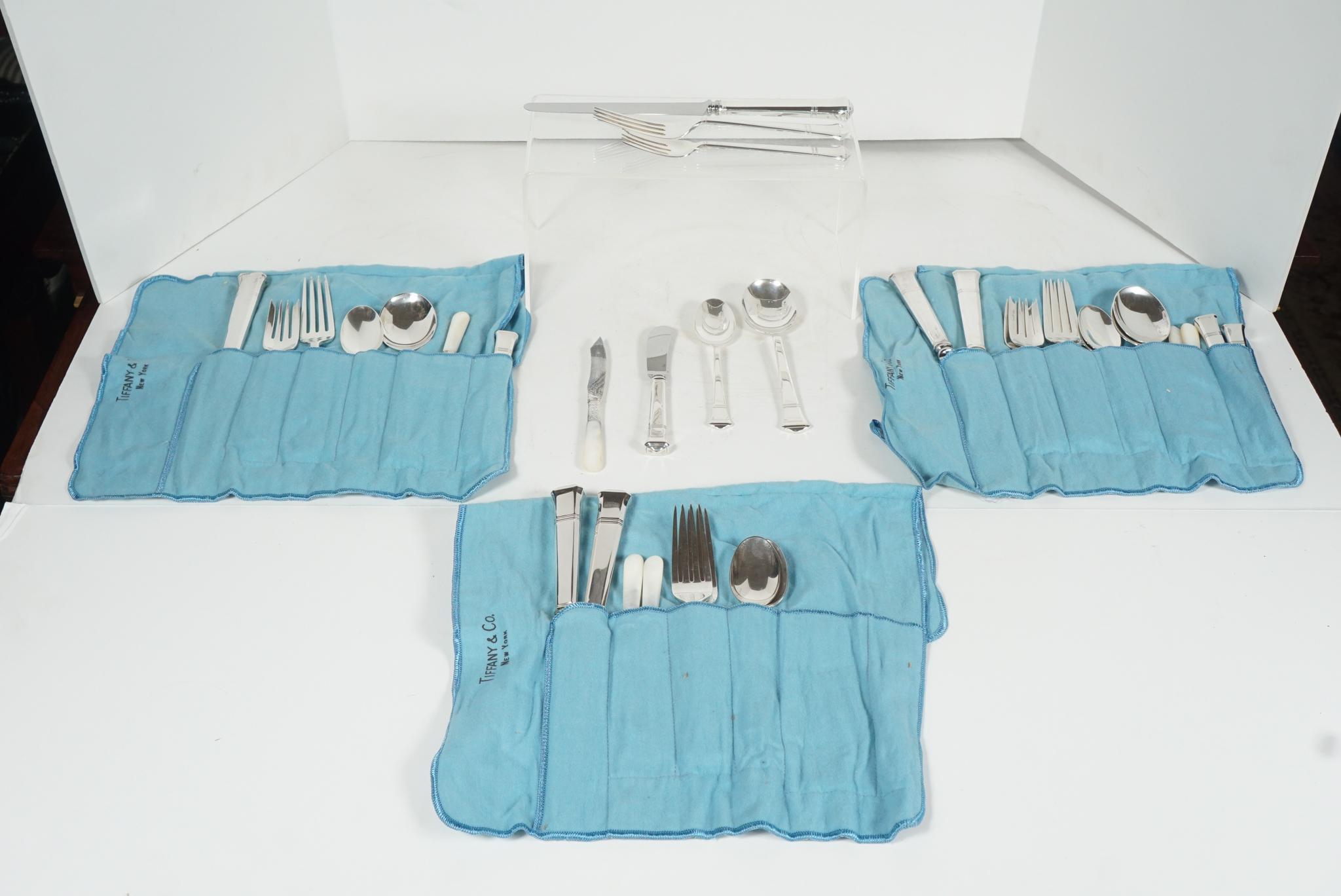 This partial set of Tiffany Windham sterling silver flatware consists of 6 dinner knives,
6 dinner forks, 6 teaspoons, 4 salad forks, 4 soup spoons and 4 butter knives.
Offered by Tiffany as a four-piece dinner setting, consisting of a dinner