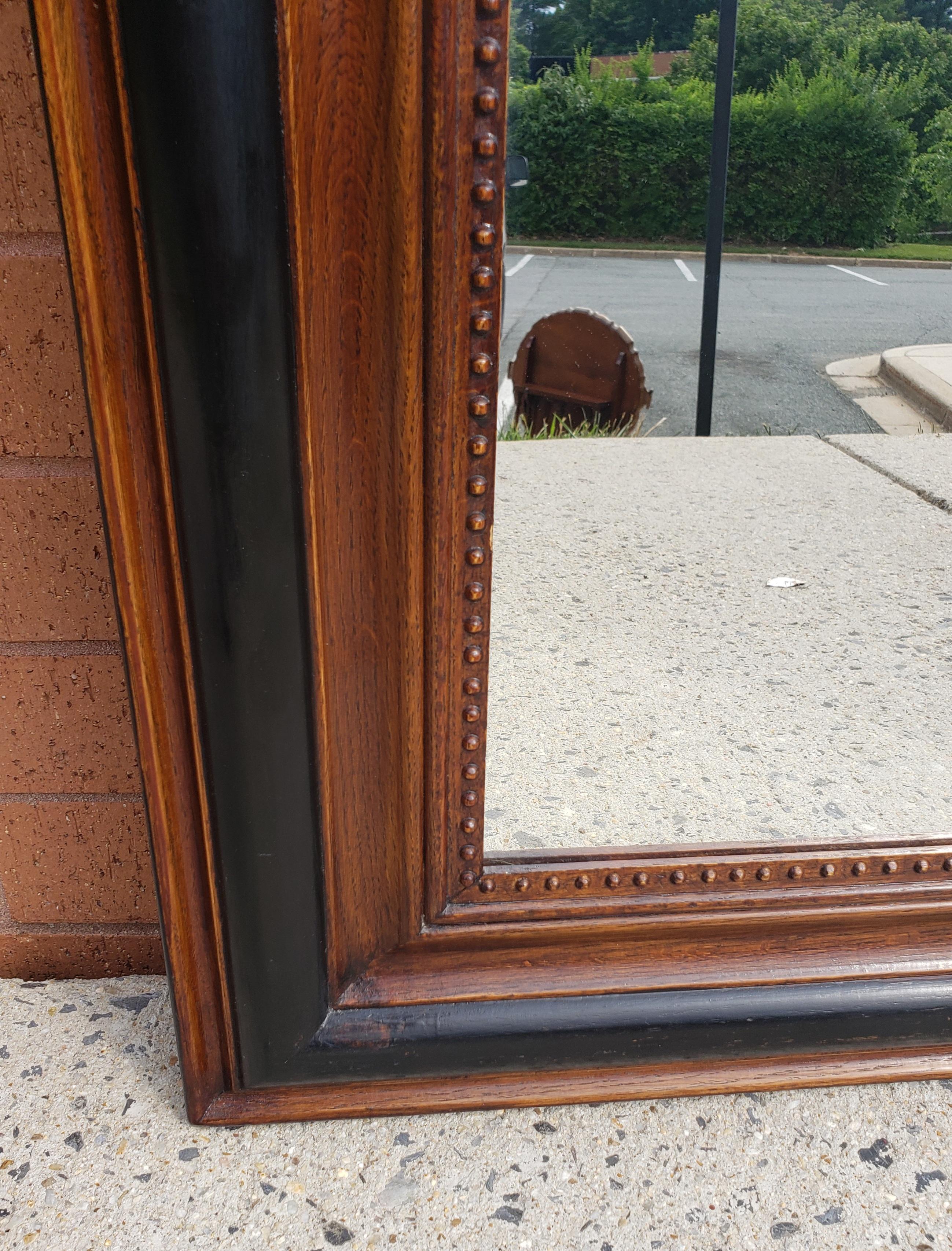 Partially Ebonized Oak Louis Phillipe Baroque Large Mirror, Circa 1920s In Good Condition For Sale In Germantown, MD