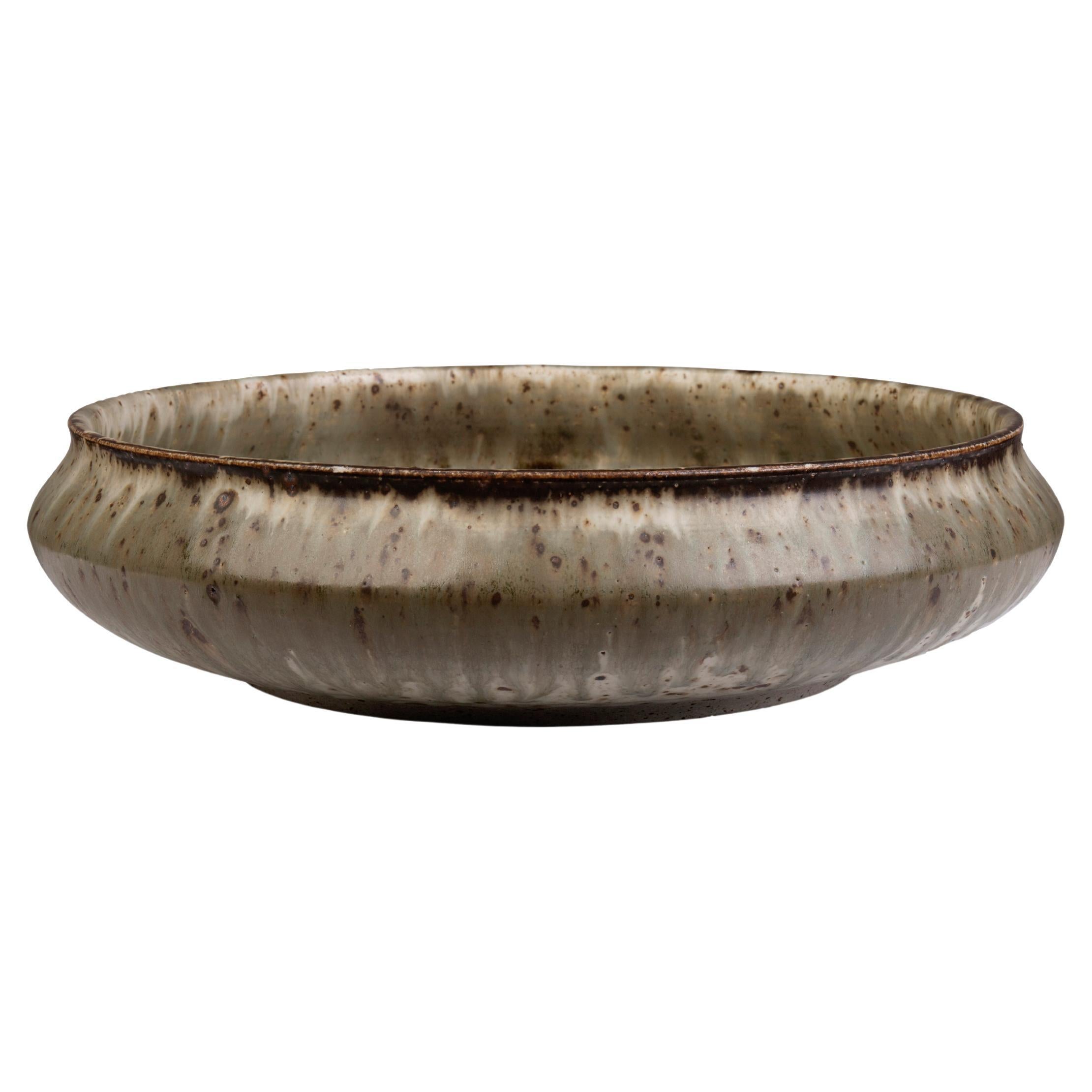 Partially glazed stoneware dish by Danish ceramist For Sale