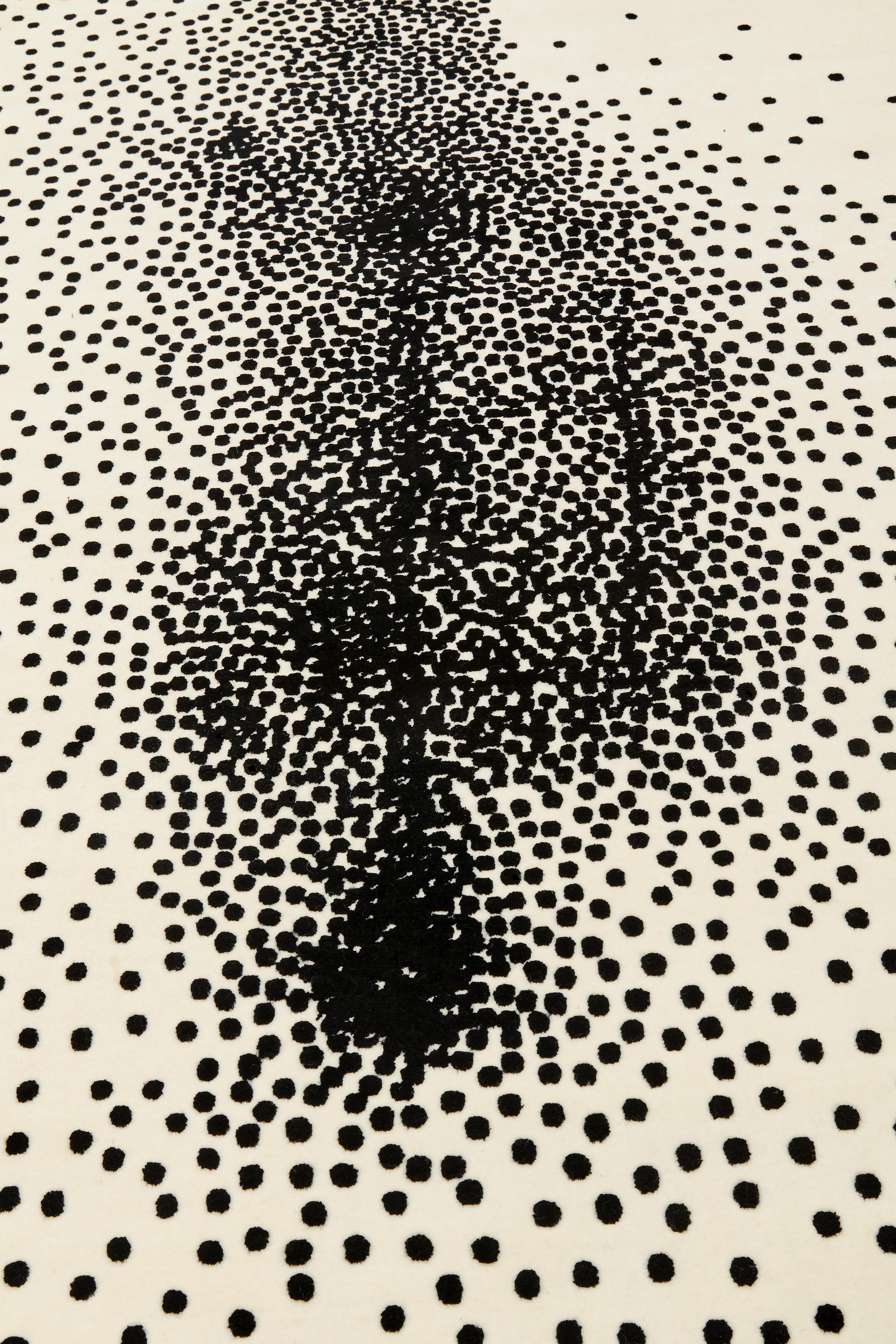Particles are a handcrafted rug that pays an affectionate tribute to the philosophical work of Gottfried Leibniz, specifically to his theory concerning monads, seen as indivisible fundamental existing entities. Measures: 200 x 300 cm.
The unique