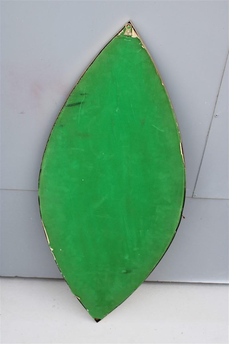 Mid-Century Modern Particular Midcentury Italian Eye Shaped Mirror in Shaped Brass 1950s For Sale