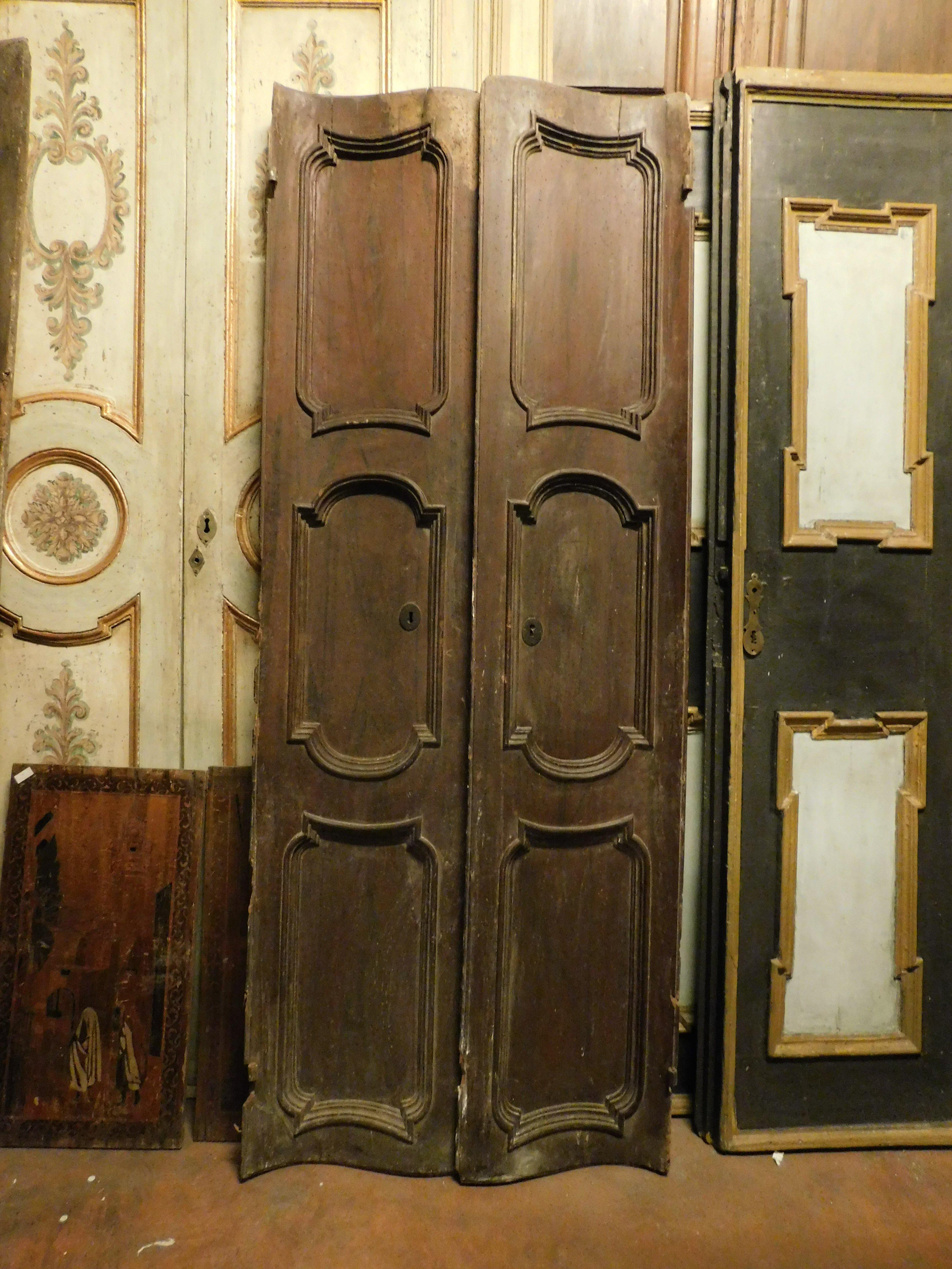Hand-Carved Particular walnut door, double-jointed with two leaves and carved panels, Italy For Sale