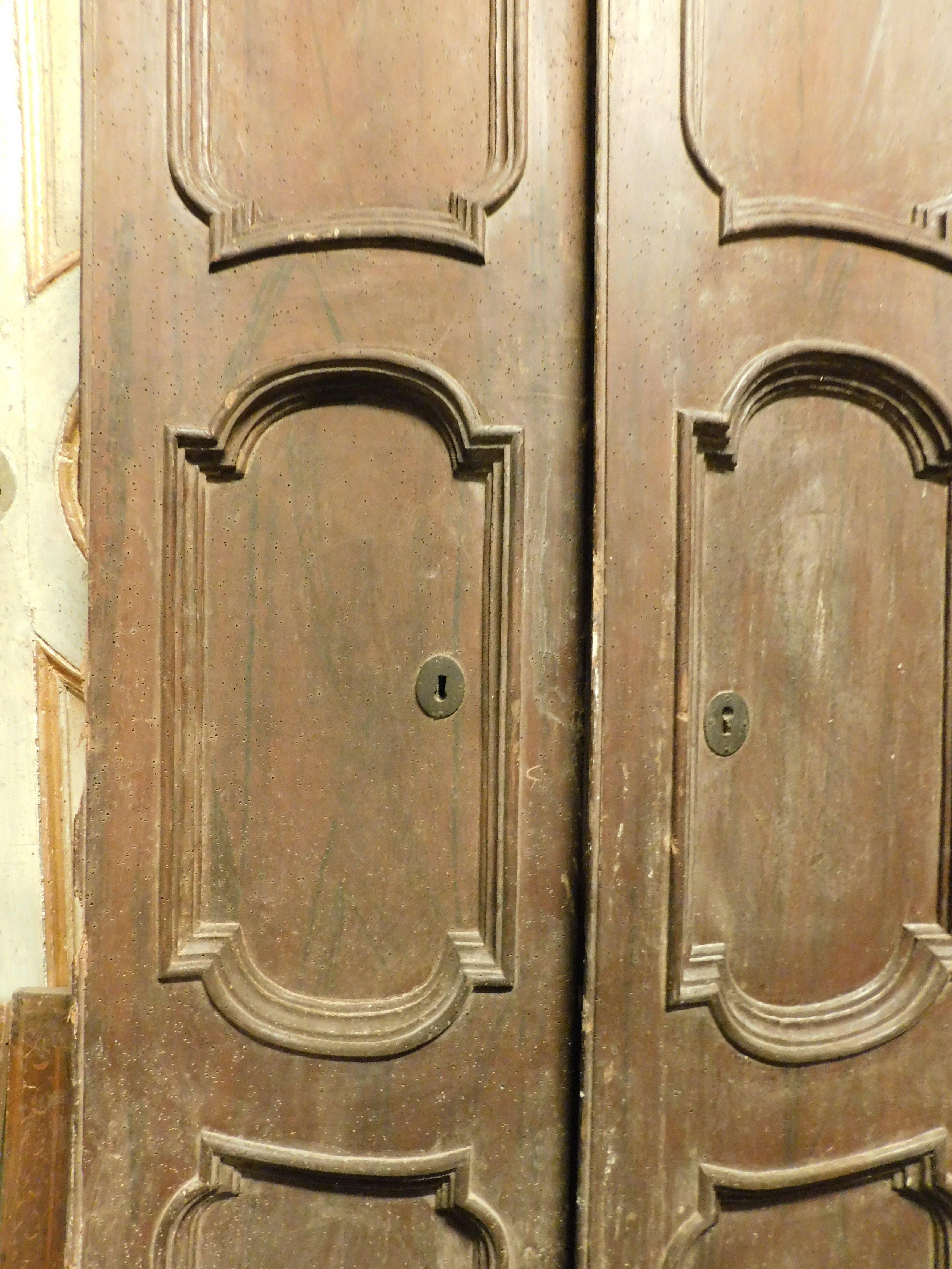 18th Century and Earlier Particular walnut door, double-jointed with two leaves and carved panels, Italy For Sale