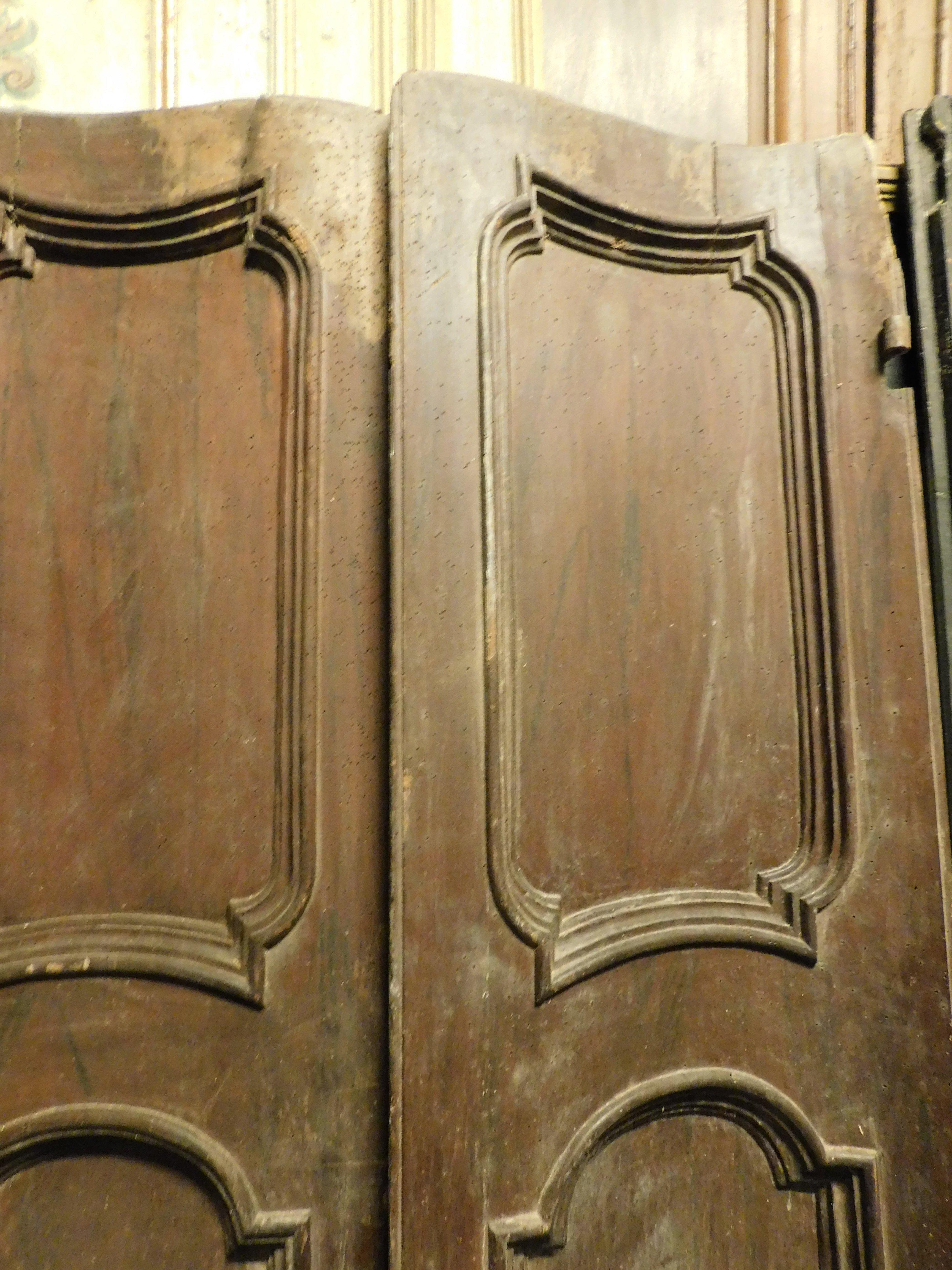 Walnut Particular walnut door, double-jointed with two leaves and carved panels, Italy For Sale