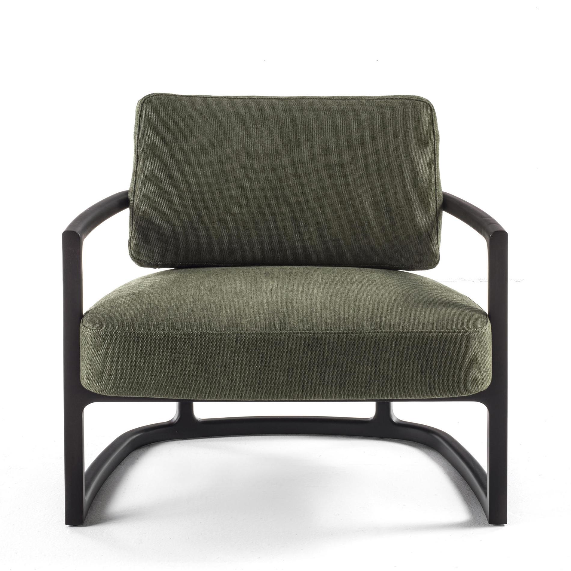 Armchair partner with structure in solid ash wood
in wengé colored finish. Upholstered and covered
with green coton fabric Cat C.
Also available with other fabrics on request.