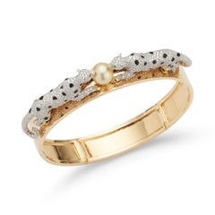 Manchette en or 18 carats avec diamants et perles des mers du Sud et léopards