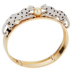 Diamond and South Sea Pearl Cuff with Crouching Leopards 18KYG