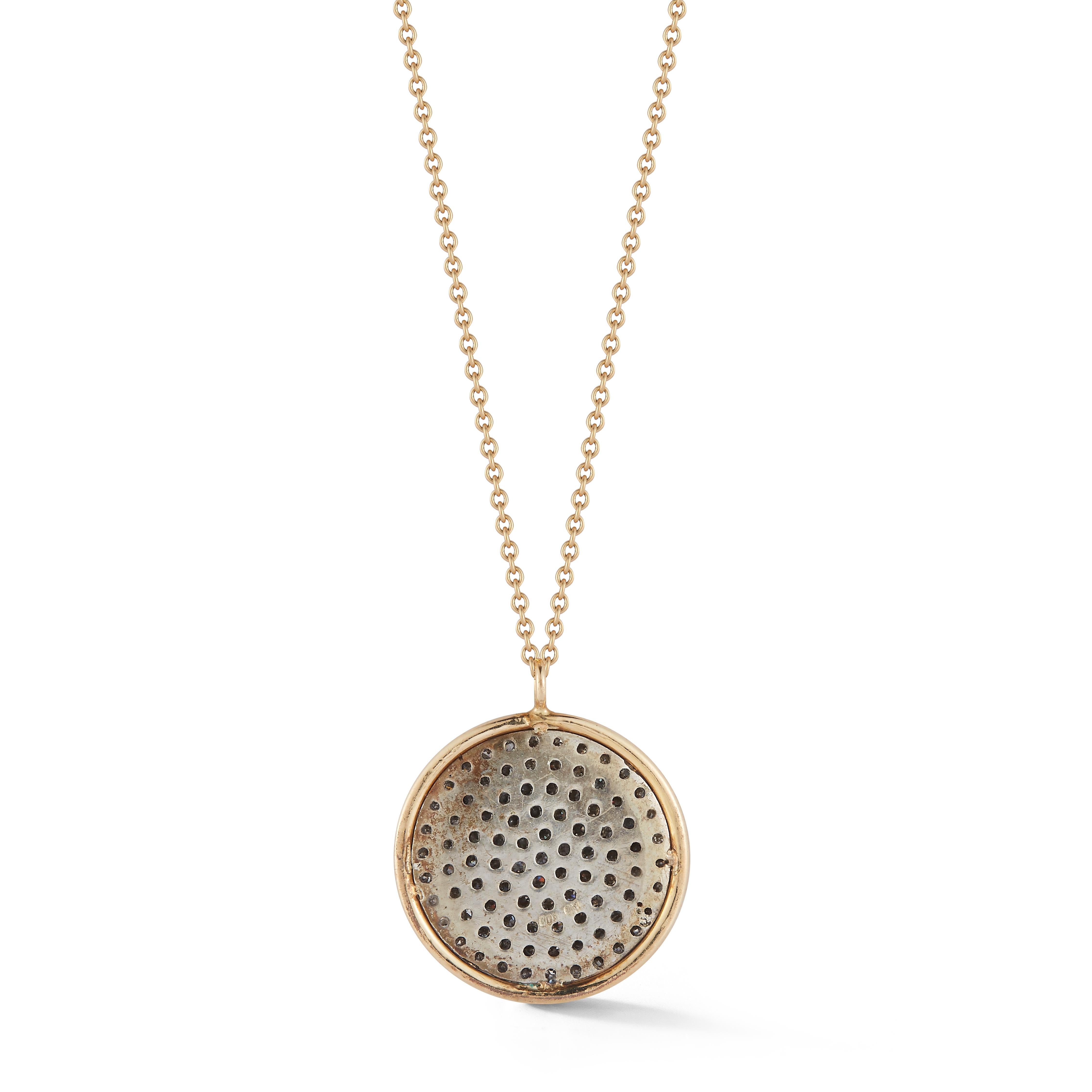 Parulina Couture Fine Jewelry- Diamond Disc Pendant in Silver and Yellow Gold Wire from the Night Sky Collection.
Disc measures 14mm.
16.5 inch chain length.

Metal: Silver and Yellow Gold
Diamond Carat Weight: 0.63ct

