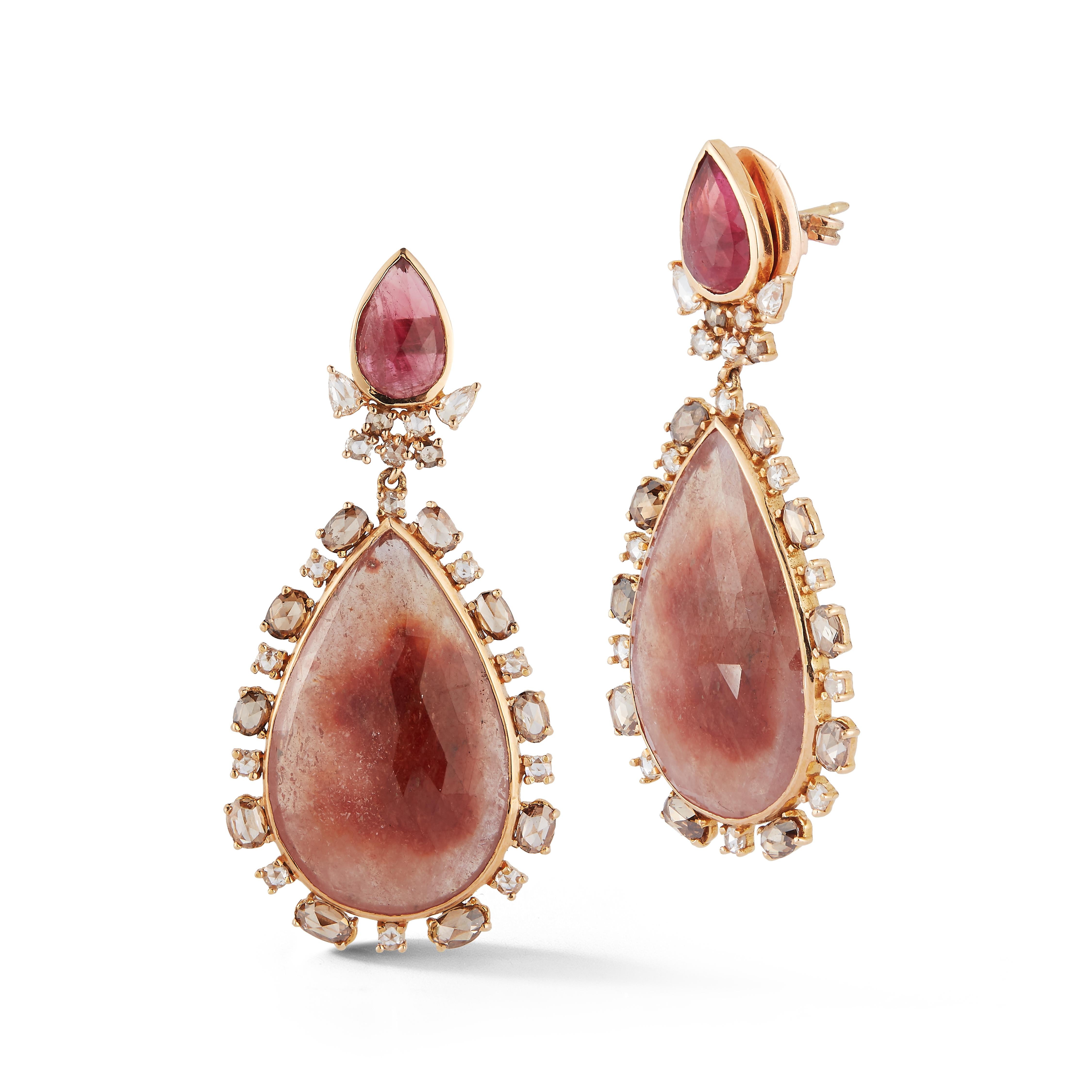 Parulina Couture Fine Jewelry- Pink Sapphire Earrings from the Bohemian Rhapsody Collection. 
These gorgeous earrings feature 45.55ct of 2 large Pink/Brown Sapphires and and is topped with 2 Pink Tourmalines at 3.62ct. There is 2.33ct of Brown Oval