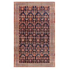 Tapis ancien en laine d'agneau bleu marine de la collection Melody