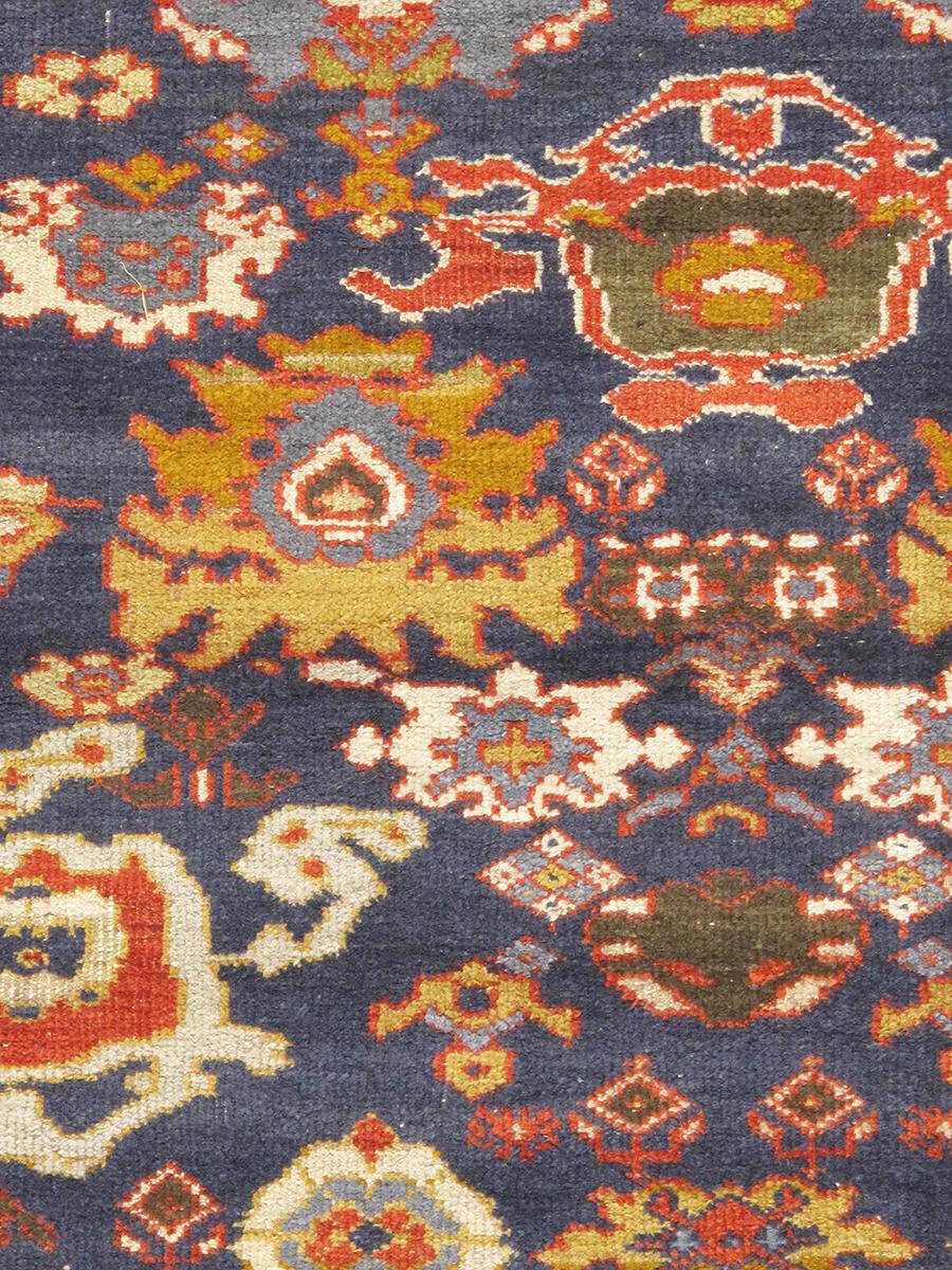 Antique Melody Collection. This rug’s handmade, hand-knotted construction adds durability to this rug, ensuring it will last for many years. Each rug is handmade with 100% premium lamb's wool. With its timeless style, this rug is an elegant addition